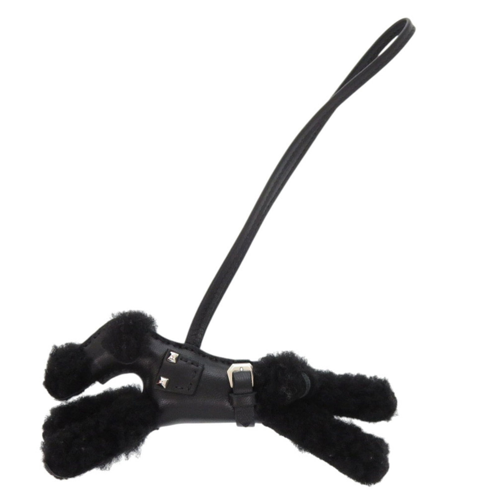 Handbag Charm Agneau Hermes Leather: Handbag Charm Agneau Hermes Leather Agneau Milo leather from Hermes Country of Origin: France, featuring Mouton design in black. This handbag charm showcases the iconic style of Hermes' signature patt