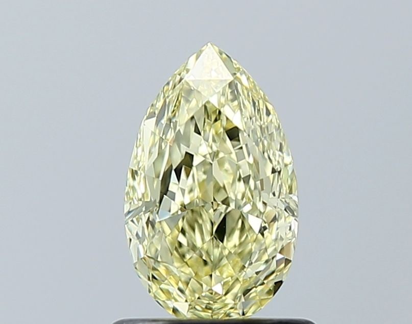 GIA Pear 1.01ct Fancy Yellow VVS2 - Loose Natural Diamond: GIA Pear 1.01ct Fancy Yellow VVS2 - Loose Natural Diamond GIA certifies this loose natural Fancy Yellow VVS2 diamond with exceptional clarity and polish. Measuring 1.01 carats, its vibrant yellow hue 