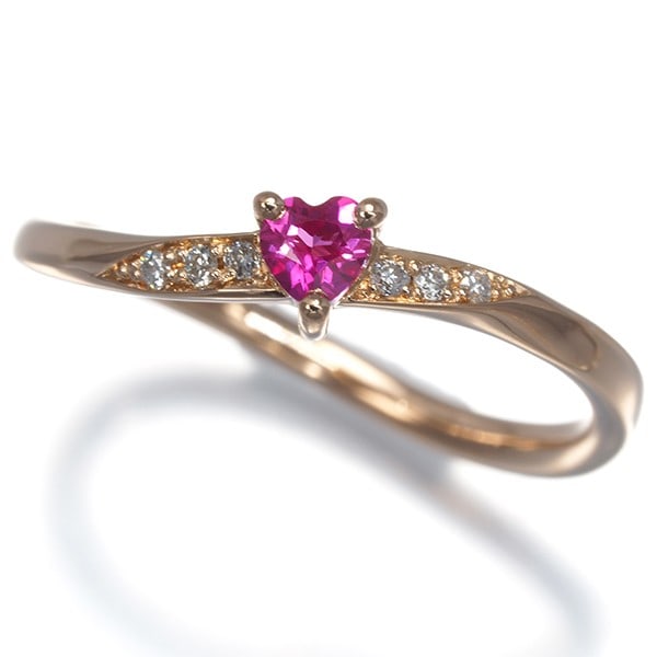 Ring Ruby Diamond Heart Us4.5 18K 750 Rose Gold: Ring Ruby Diamond Heart Us4.5 18K 750 Rose Gold The Ring Ruby Diamond Heart Us4.5 18K 750 Rose Gold boasts an elegant design with a natural ruby at its center, surrounded by a diamond accent. This bea