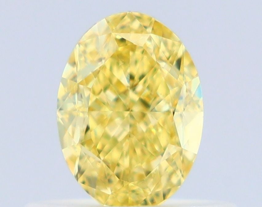 GIA Oval 0.52ct Fancy Intense Yellow VVS2 - Loose Natural Diamond: GIA Oval 0.52ct Fancy Intense Yellow VVS2 - Loose Natural Diamond GIA Oval 0.52ct Fancy Intense Yellow VVS2 - Loose Natural Diamond is a stunning example of natural beauty, boasting an EX polish and G