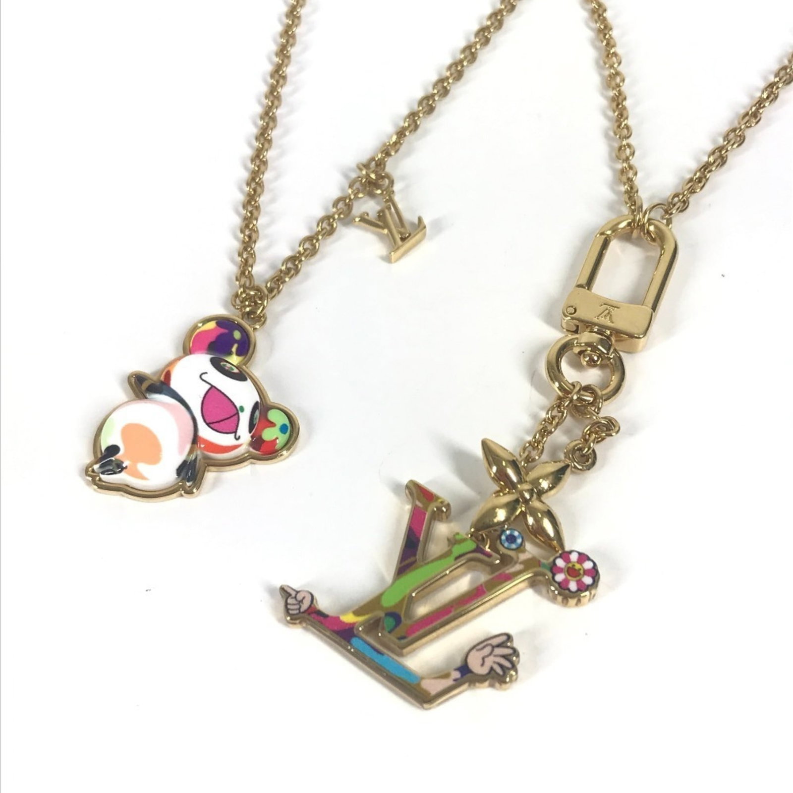 Louis Vuitton M02499 Lv X Tm Takashi Murakami Panda Set Of 2 Necklaces - Superflat Chain Necklaces: Louis Vuitton M02499 Lv X Tm Takashi Murakami Panda Set Of 2 Necklaces - Superflat Chain Necklaces Superflat Chain Necklaces from Louis Vuitton's M02499 Lv X Tm Takashi Murakami Panda Set of 2, featur