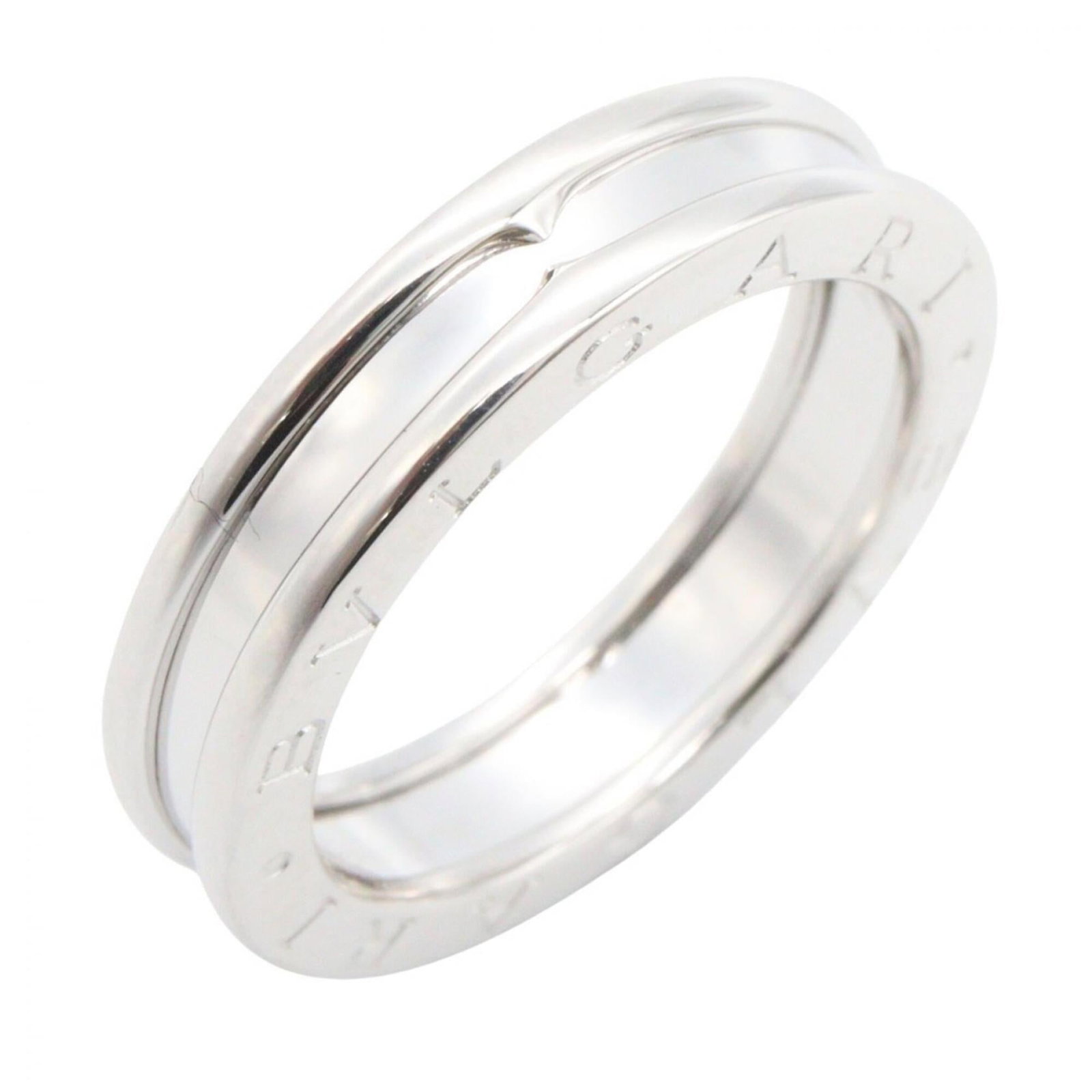 Bvlgari Band Ring White Gold (18K): Bvlgari Band Ring White Gold (18K) White gold (18K) band ring from Bvlgari, available in US size 6.5. This silver band features the iconic Bvlgari brand and is crafted with high-quality materials for 