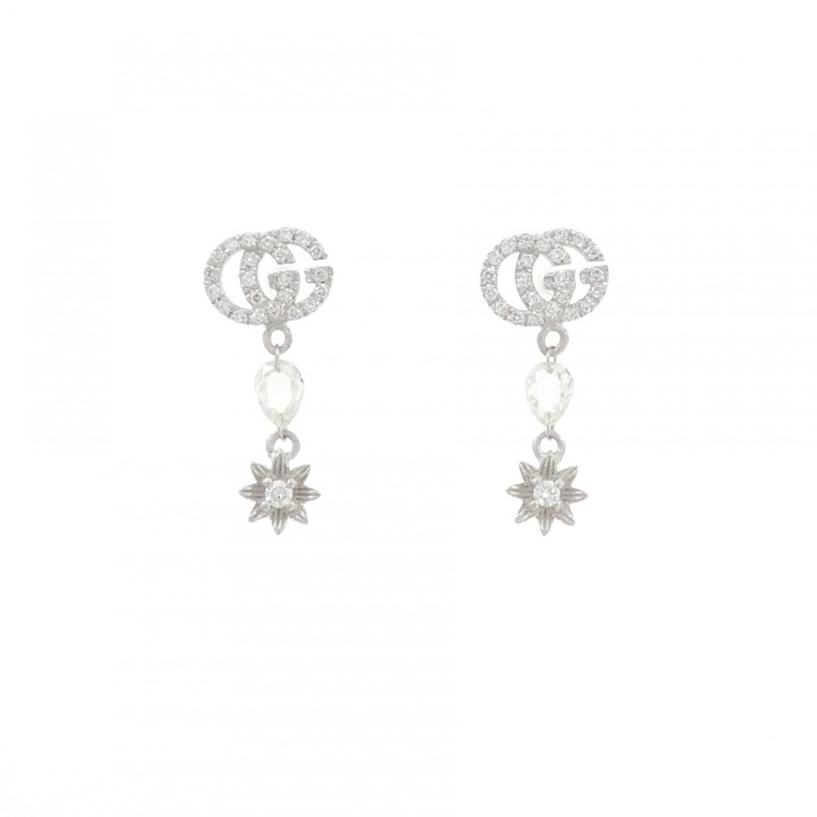 White Gold 18K Gucci Stud Earrings: White Gold 18K Gucci Stud Earrings White gold (18K) stud earrings from Gucci feature a sleek and modern design, measuring 17.00mm x 7.10mm in size. Made with high-quality white gold material, these ea