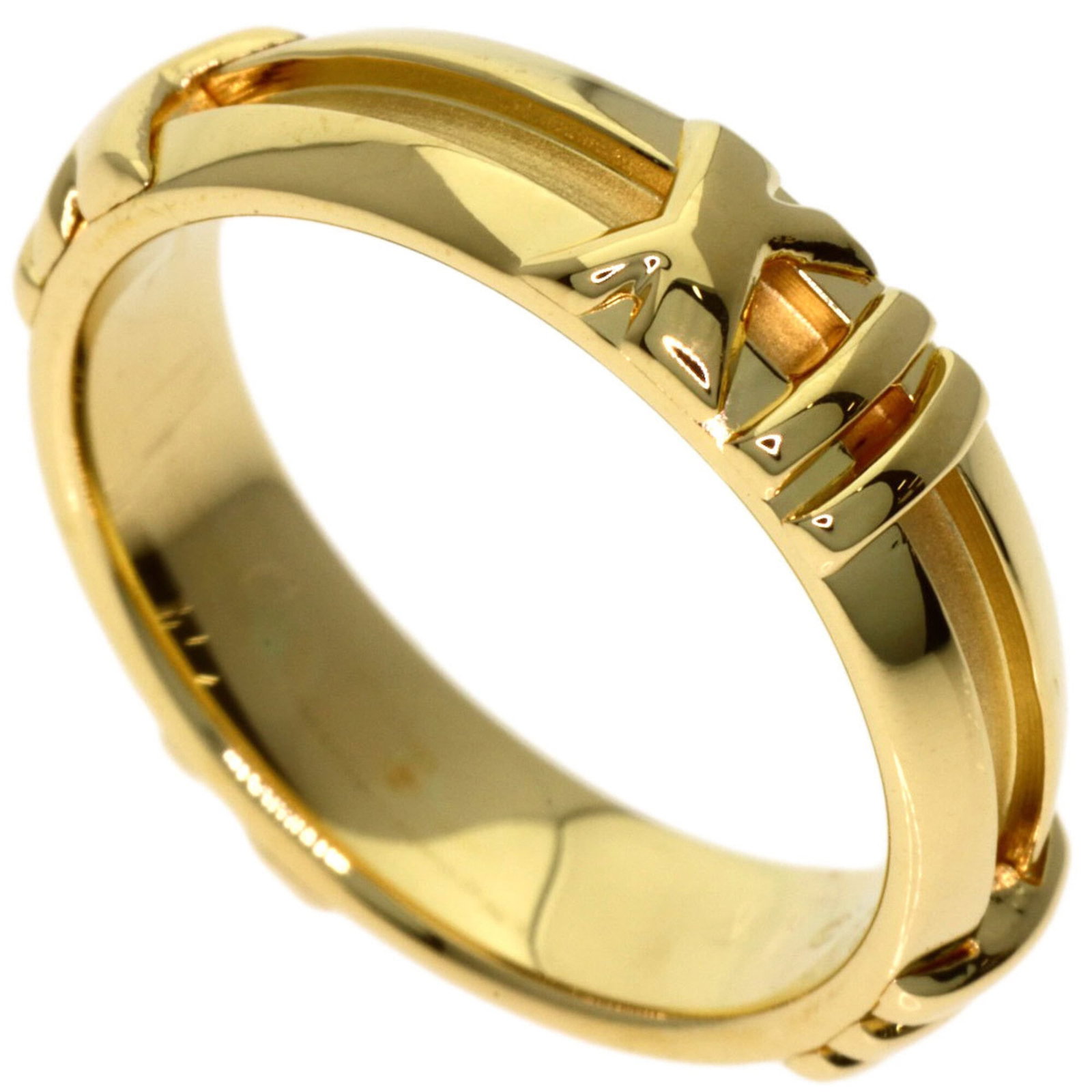 Tiffany ring gold 18k yellow band: Tiffany ring gold 18k yellow band 18k yellow gold band ring from Tiffany's Atlas line, featuring a sturdy 4.5mm wide and 0.18" thick design with a weight of 4.3g per piece. This 4.5 US size ring is cr