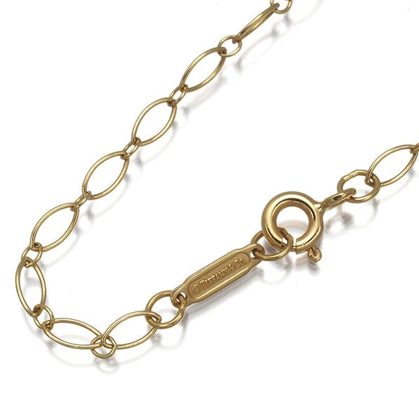 Yellow Gold Chain Necklace Tiffany Co. Ovallink 18K 46cm: Yellow Gold Chain Necklace Tiffany Co. Ovallink 18K 46cm Yellow Gold Chain Necklace from Tiffany & Co. - A sleek and sophisticated 18k yellow gold chain necklace, measuring 46cm in length, with a deli