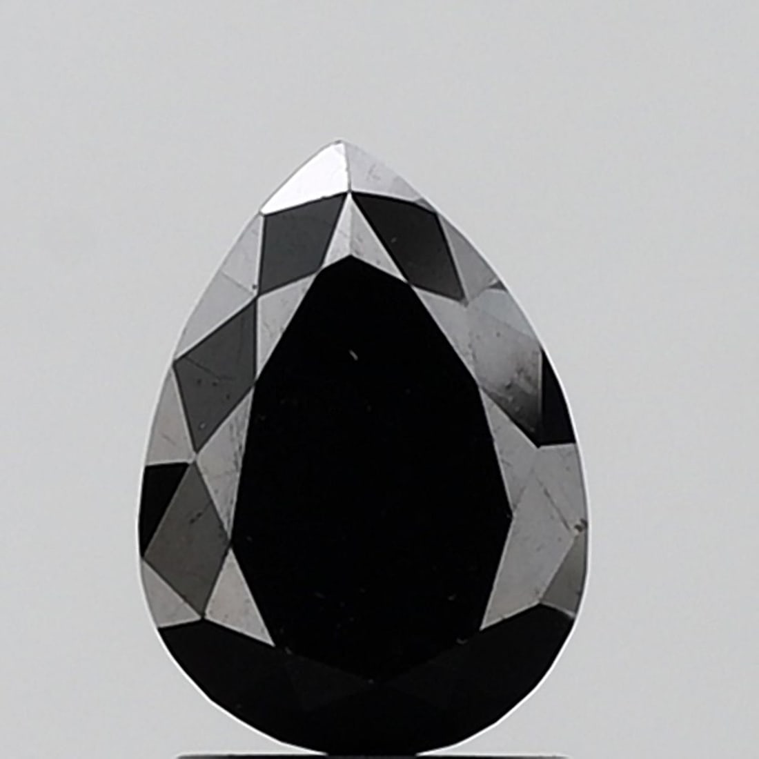 Pear 1.89ct Fancy Black VVS2 - Loose Natural Diamond: Pear 1.89ct Fancy Black VVS2 - Loose Natural Diamond 1.89ct Fancy Black VVS2 - Loose Natural Diamond, boasting an exceptional EX polish and symmetry, showcases its striking appearance with a deep blac