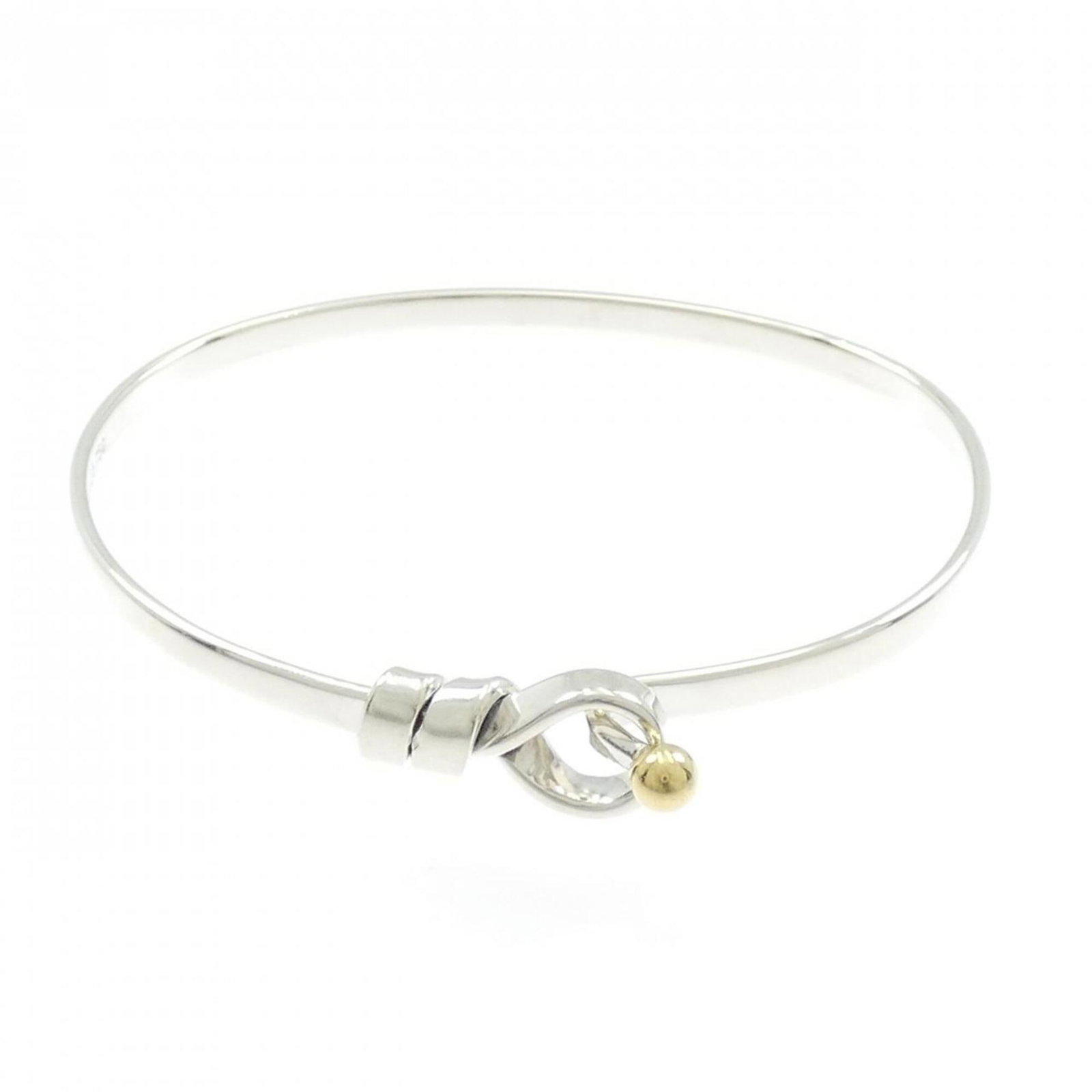 Yellow Gold 925 Silver Bangle Tiffany: Yellow Gold 925 Silver Bangle Tiffany Yellow gold 925 Silver Bangle Tiffany bears a signature. Made from high-quality materials, including 18K yellow gold and sterling silver, this bangle combines ele
