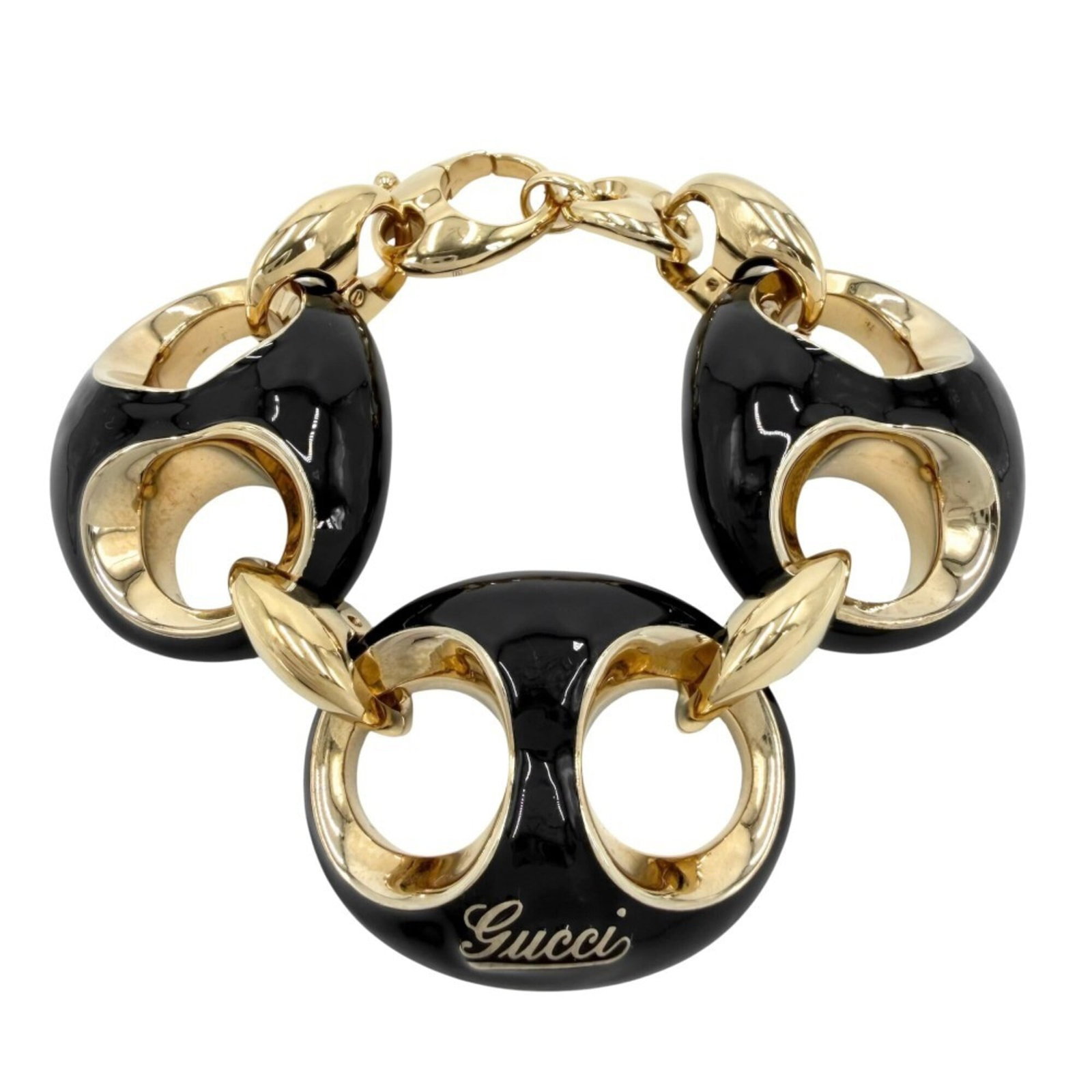 Charm Gucci Bracelet: Charm Gucci Bracelet Charm Gucci Bracelet in Black and Gold, measuring 18cm in length. This charm bracelet features a distinctive black and gold design, showcasing its sleek and sophisticated style. T
