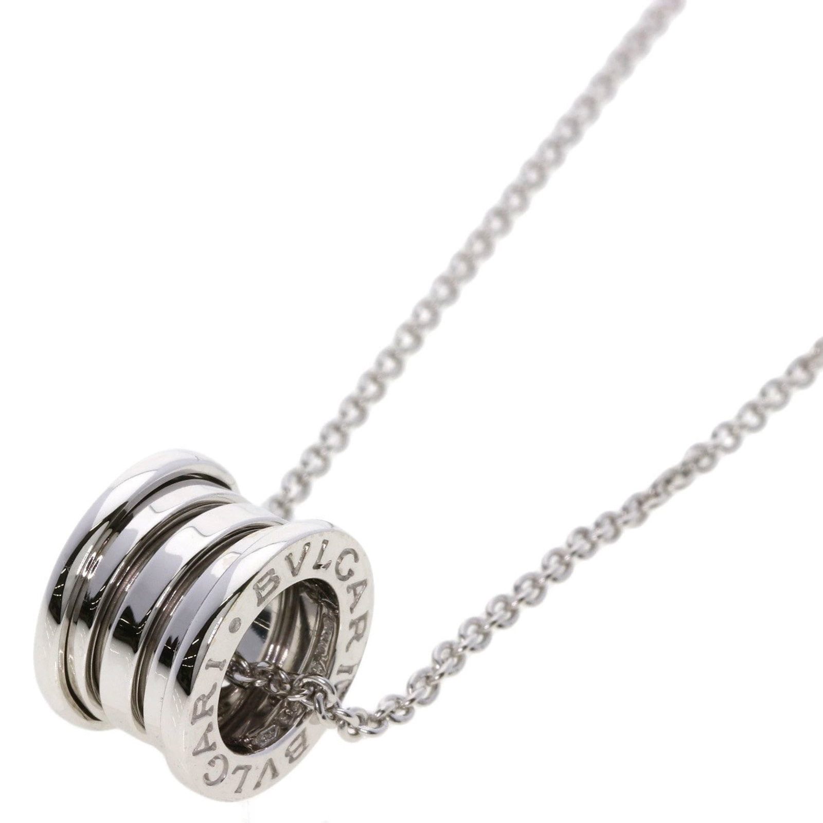 Bvlgari B-Zero1 Necklace In 18K White Gold For Women: Bvlgari B-Zero1 Necklace In 18K White Gold For Women Bvlgari B-Zero1 Necklace In 18K White Gold For Women features a sleek design with a pendant size of 14.5mm x 10mm, set in 18K white gold. The neckl
