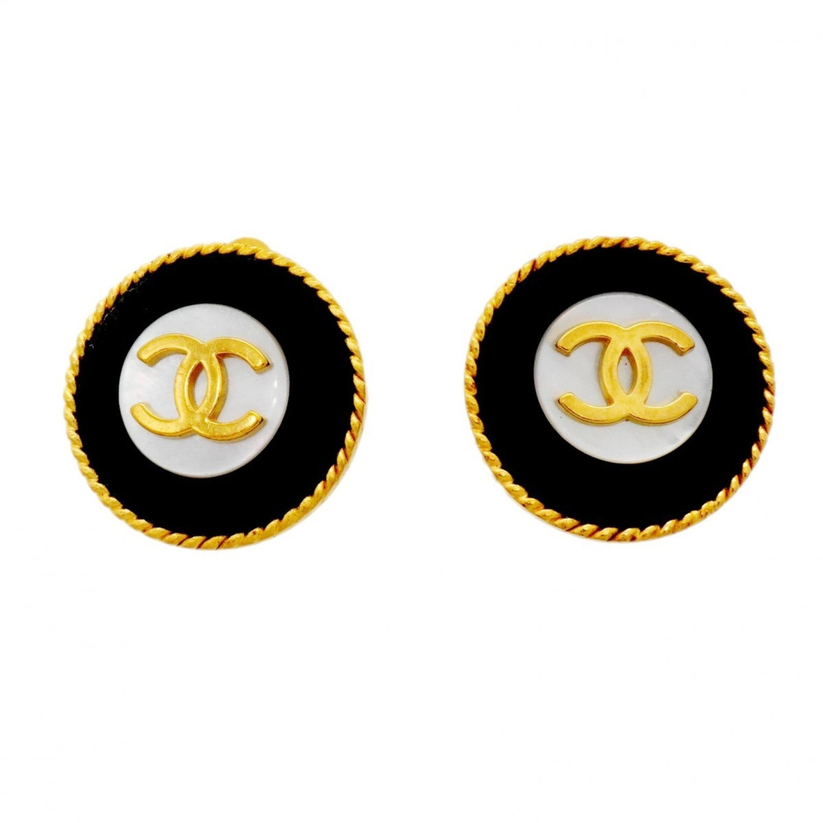 Chanel Clip Earrings Gold Plating: Chanel Clip Earrings Gold Plating Chanel Clip Earrings in Gold Plating are designed with sleek black, gold, and white details. The earrings feature a classic clip design that can be easily attached to