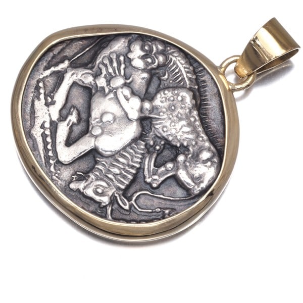 Vintage Coin Pendant Silver950/ 18K 750 Yellow Gold: Vintage Coin Pendant Silver950/ 18K 750 Yellow Gold Sterling Silver Pendant with 18K Yellow Gold Accents. This vintage coin pendant boasts a striking design, featuring a silver frame plated with gold,
