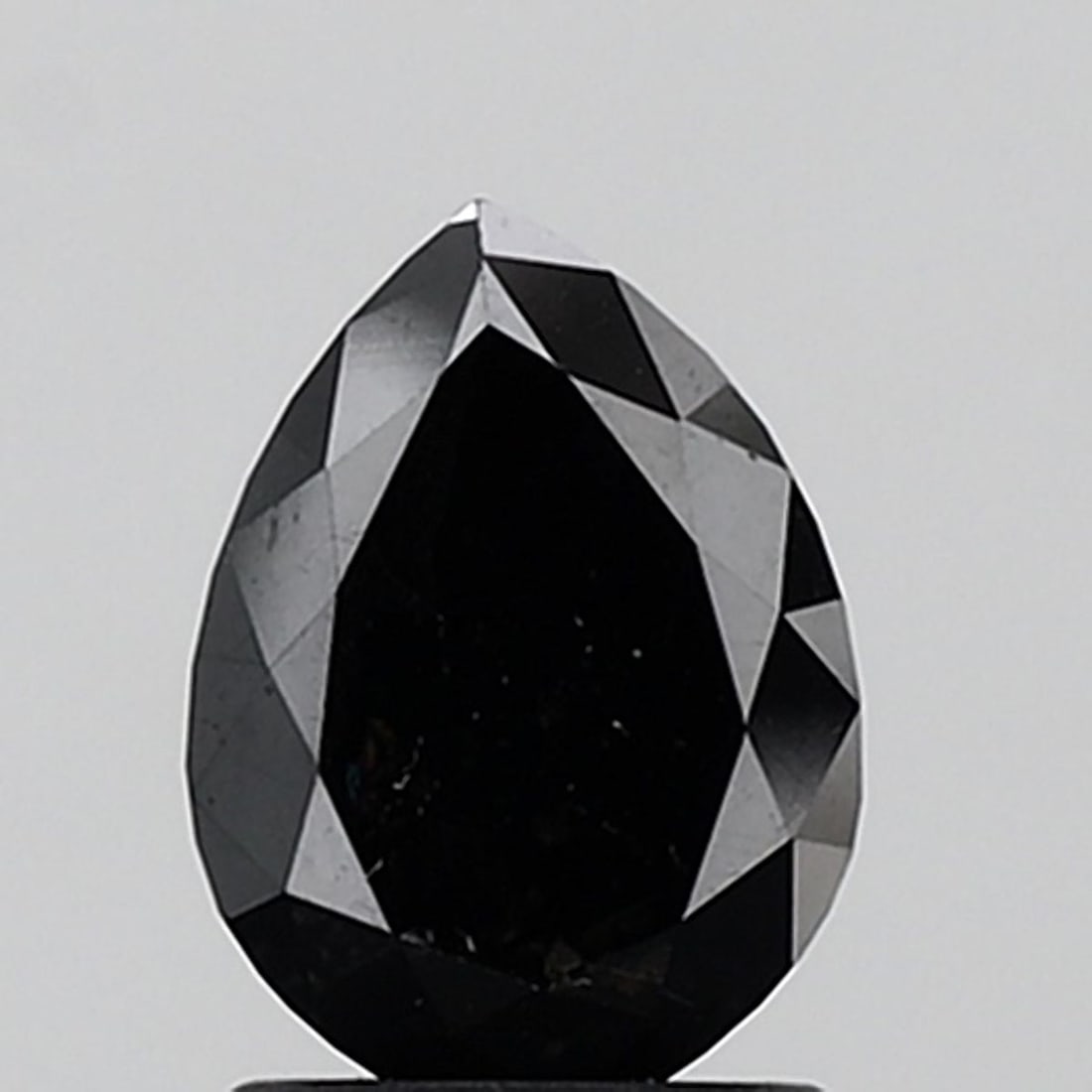 Pear 1.47ct Black VVS2 - Loose Natural Diamond: Pear 1.47ct Black VVS2 - Loose Natural Diamond The 1.47ct Black VVS2 diamond boasts exceptional clarity and polish, with an EX symmetry that showcases its natural beauty. Its rare black color stands o