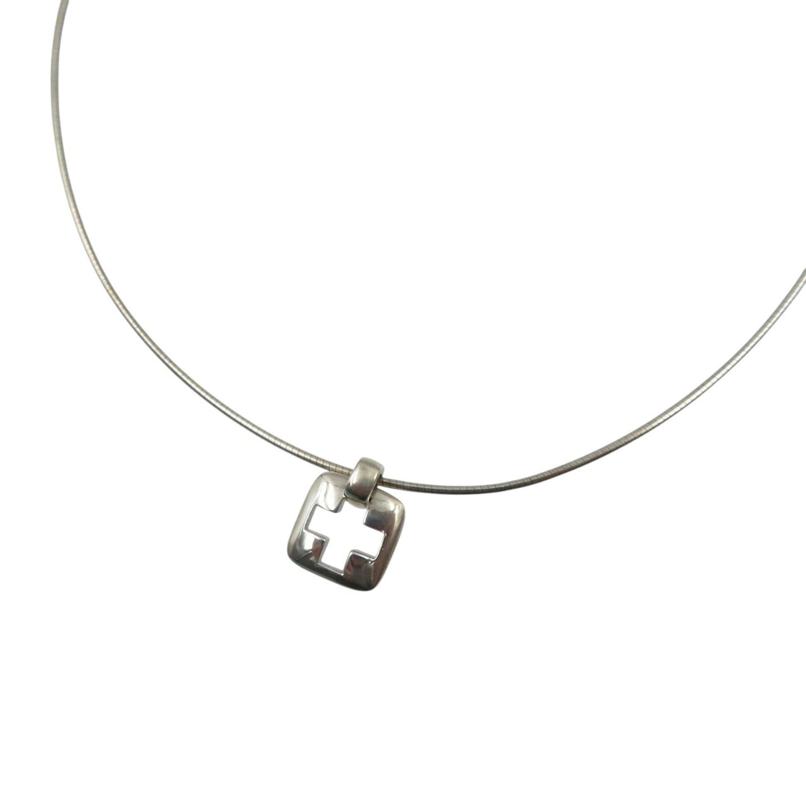 Sterling silver pendant necklace cross square open 925 Tiffany & Co.: Sterling silver pendant necklace cross square open 925 Tiffany & Co. Sterling silver pendant necklace with an open cross square design, crafted from high-quality Silver925 metal. This elegant piece fe