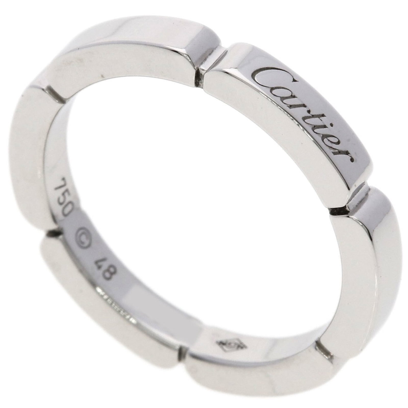 White Gold Band Ring by Cartier 18K: White Gold Band Ring by Cartier 18K Cartier's iconic band ring features an 18K white gold construction, with a slender 2.5mm width and a US size of 4.5. Weighing in at 3.9g, this elegant piece showcas
