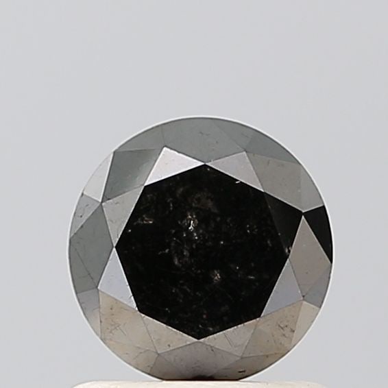 Round 0.86ct Black VVS2 - Loose Natural Diamond: Round 0.86ct Black VVS2 - Loose Natural Diamond 0.86ct Black VVS2 - Loose Natural Diamond. This exquisite diamond boasts an EX cut, VVS2 clarity, and a mesmerizing black color, making it a true