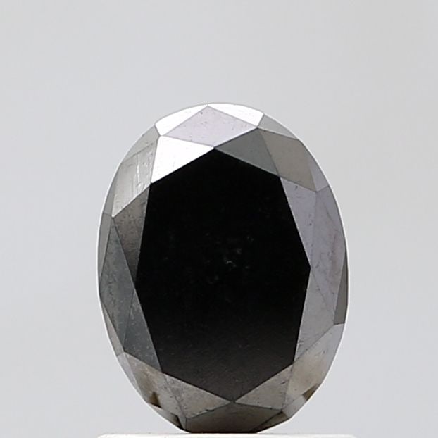 Oval 1.51ct Black VVS2 - Loose Natural Diamond: Oval 1.51ct Black VVS2 - Loose Natural Diamond Oval cut diamond with exceptional clarity and polish, measuring 7.59L x 5.66W x 3.94H, showcases a deep black color and impressive VVS2 clarity grade. Ce