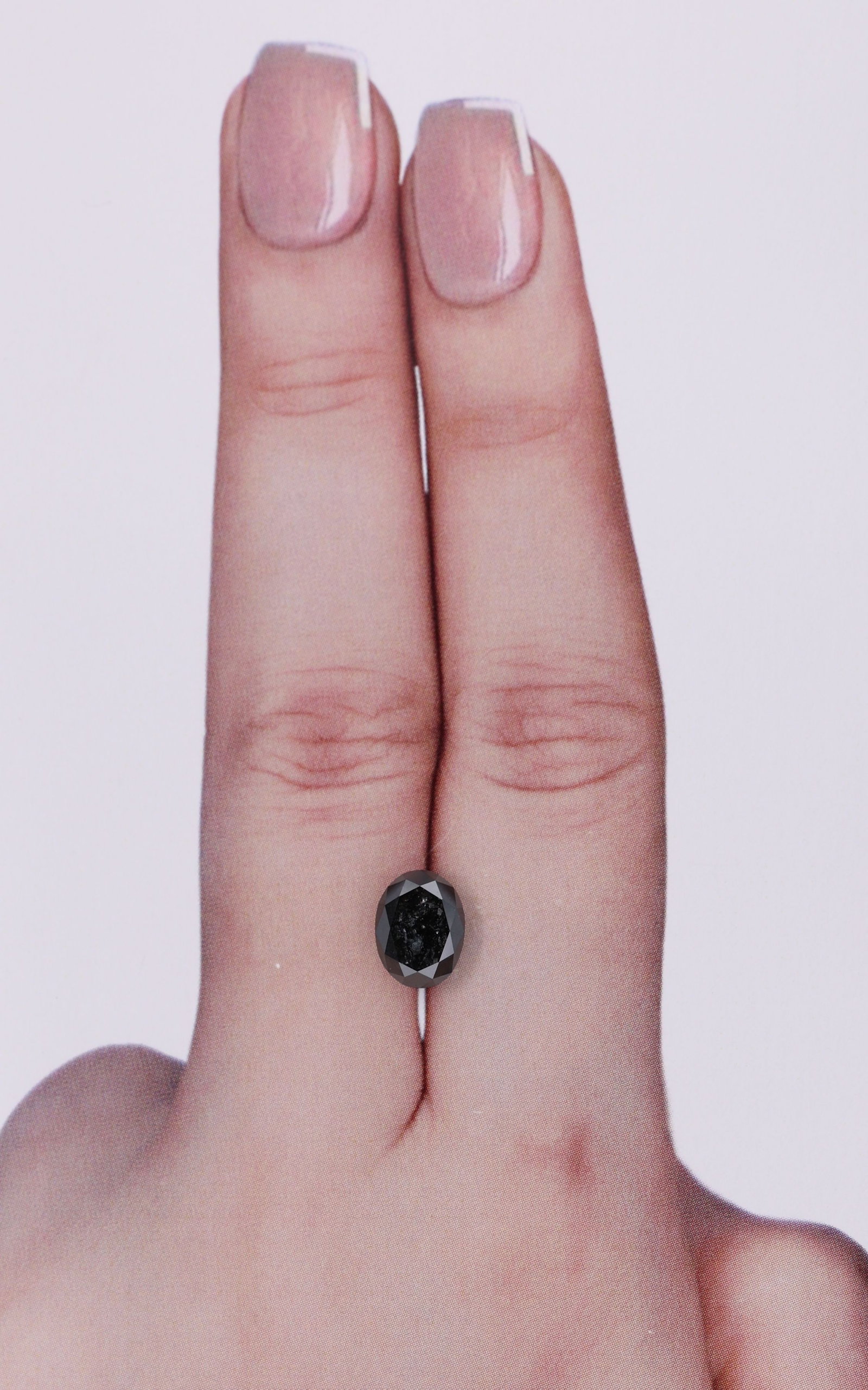 GIA Oval 1.7ct Fancy Black VVS2 - Loose Natural Diamond: GIA Oval 1.7ct Fancy Black VVS2 - Loose Natural Diamond GIA oval cut diamond with exceptional clarity and polish, boasting an impressive 1.7 carats in a rare Fancy Black color. Measuring 7.91L x 6.0W