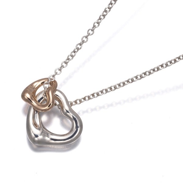 Tiffany&Co. Necklace Open Heart Bicolor Silver 925/ 18K Rg: Tiffany&Co. Necklace Open Heart Bicolor Silver 925/ 18K Rg Tiffany&Co.'s Open Heart Bicolor Silver necklace showcases Elsa Peretti's iconic design, featuring a sterling silver pendant with no stone. T
