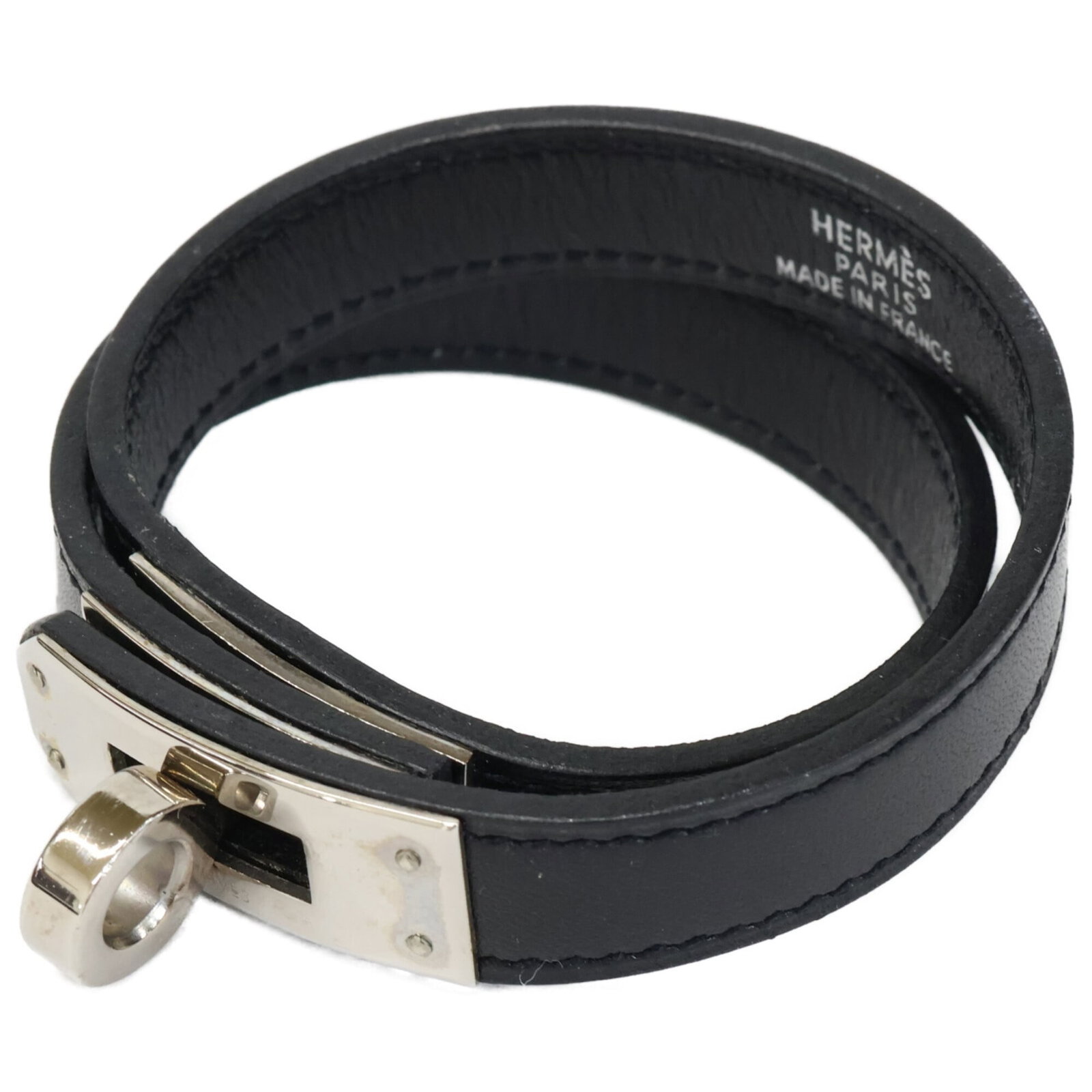 Hermes Charm Bracelet Leather: Hermes Charm Bracelet Leather Black leather charm bracelet from Hermes, measuring 37cm in length. This classic style features silver accents and a sleek design. A timeless accessory for those who appr