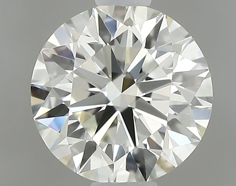 IGI Round 0.6ct K VVS1 - Loose Natural Diamond: IGI Round 0.6ct K VVS1 - Loose Natural Diamond 0.6ct K VVS1 - A Rare and Exceptional Diamond. This loose natural diamond boasts an EX cut, EX symmetry, and EX polish, showcasing its exceptional clarit