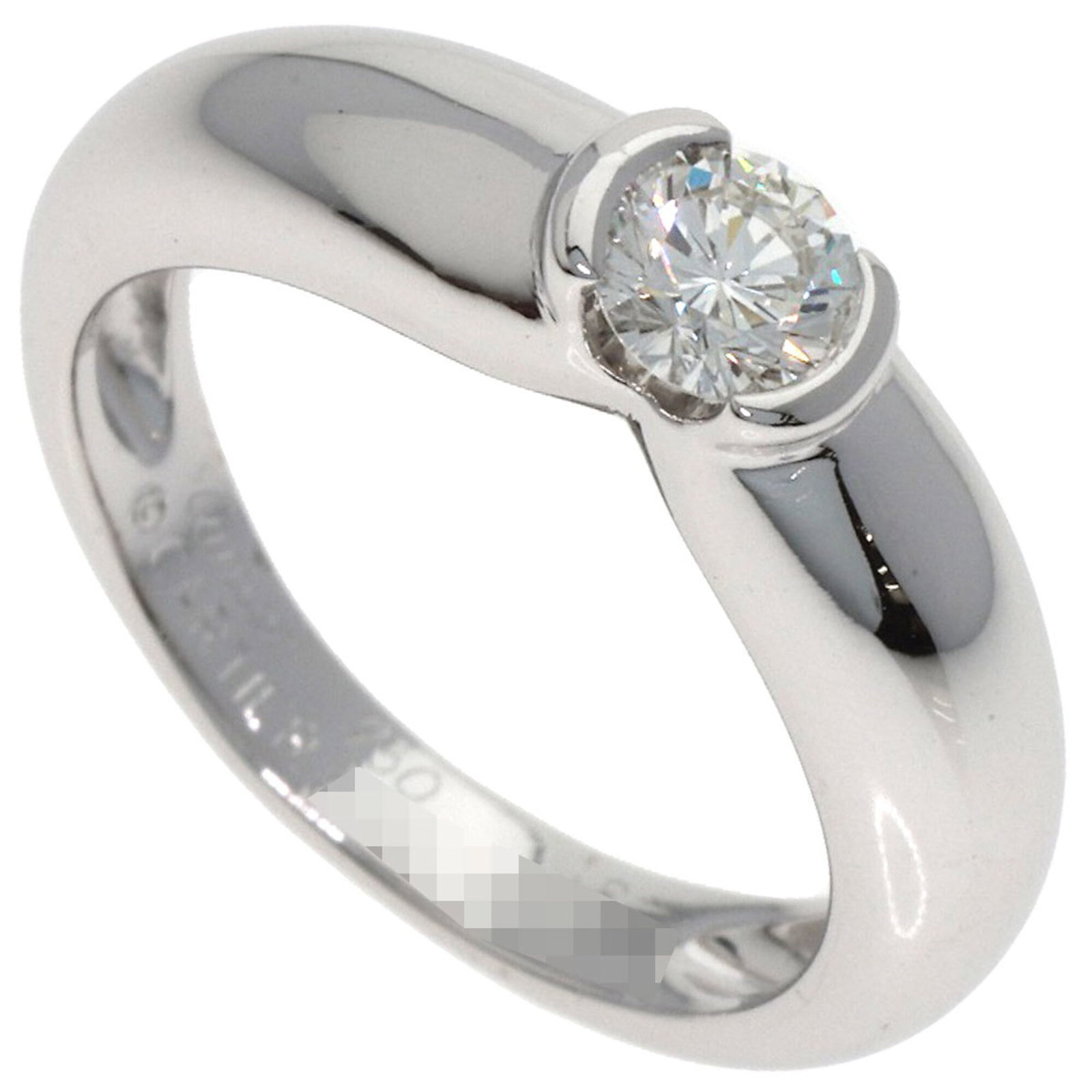 White Gold Band Ring by Cartier 18K: White Gold Band Ring by Cartier 18K Cartier's 18K white gold band ring boasts elegant simplicity with its understated design. This US size 4.5 ring features the iconic luxury brand, crafted from high-