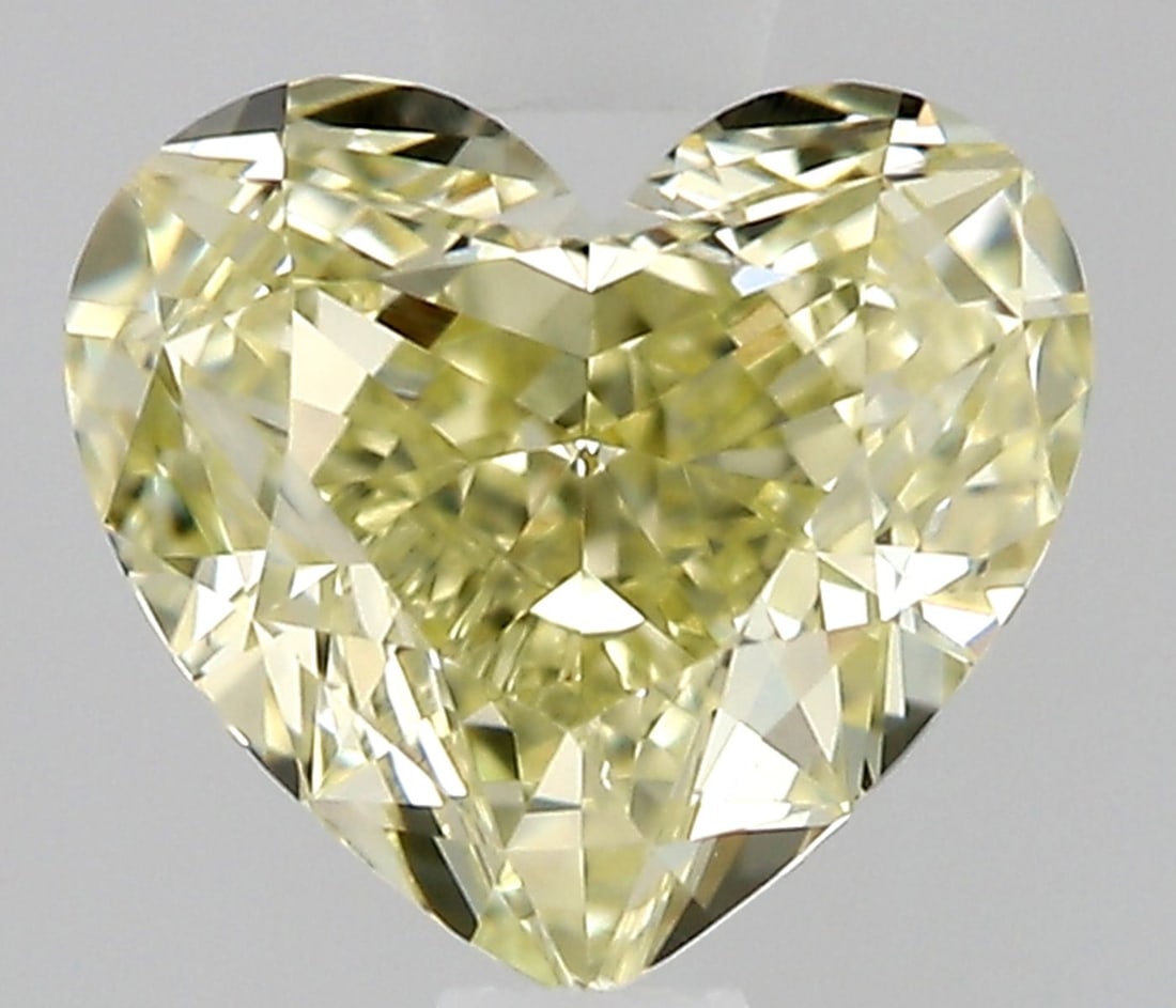 Heart 0.43ct Fancy Light Yellow VVS2 - Loose Natural Diamond: Heart 0.43ct Fancy Light Yellow VVS2 - Loose Natural Diamond 0.43ct Fancy Light Yellow VVS2 - Loose Natural Diamond, boasting exceptional clarity and vibrant color, showcases its unique beauty with a