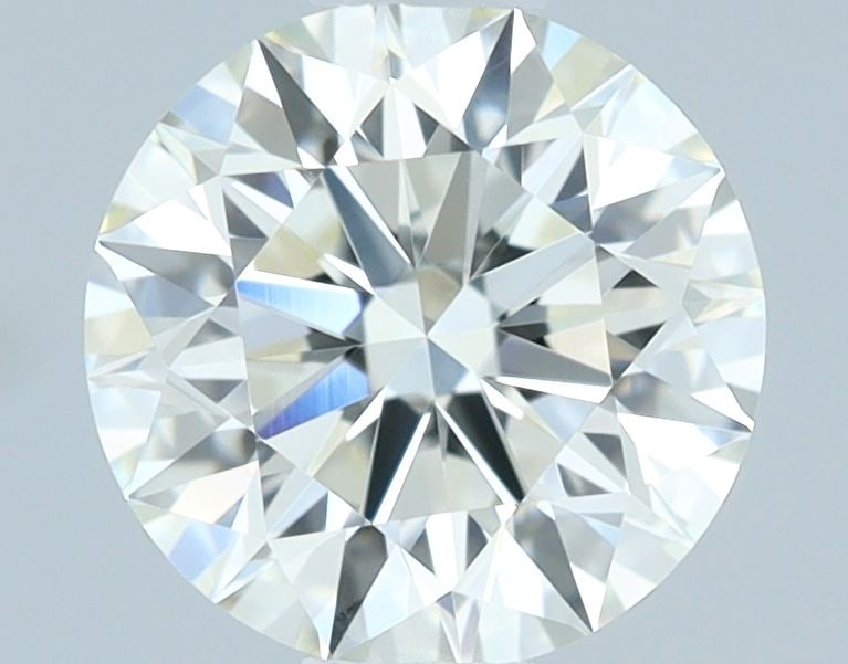 IGI Round 0.9ct J VVS1 - Loose Natural Diamond: IGI Round 0.9ct J VVS1 - Loose Natural Diamond 0.9ct IGI Round J VVS1 Diamond - Natural BeautyThe IGI certified 0.9ct round diamond boasts exceptional clarity with its VVS1 grade, and a color that shi