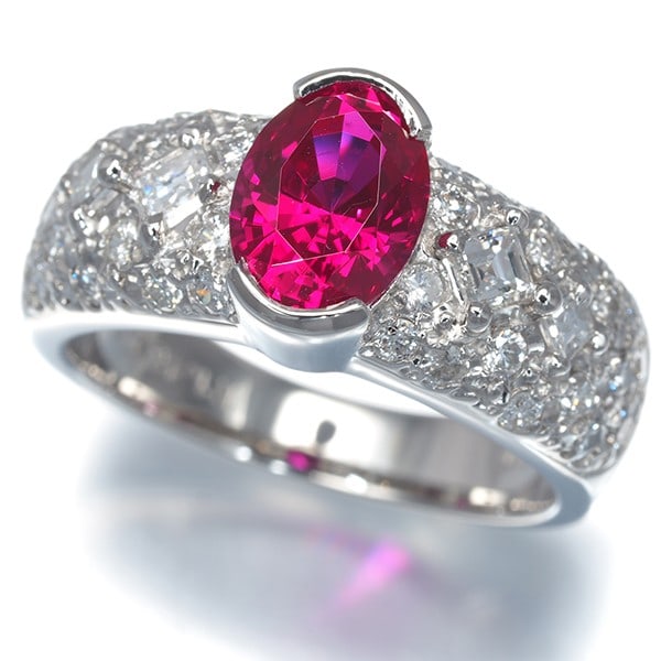 Crescent Vert Ring Lab-Created Ruby 1.48Ct Diamond 0.82Ct Paved Pt 900: Crescent Vert Ring Lab-Created Ruby 1.48Ct Diamond 0.82Ct Paved Pt 900 Lab-created Ruby and Diamond Accent Ring in Platinum. This stunning ring features a 1.48ct lab-created ruby at its center,