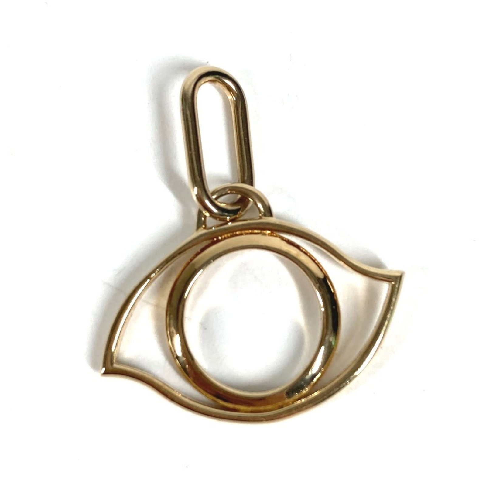 Hermes Curiosit Eye Charm Pendant necklace metal top men's women gold: Hermes Curiosit Eye Charm Pendant necklace metal top men's women gold Gold Hermes Curiosit Eye Charm Pendant Necklace for Men and Women. This men's and women's gold pendant necklace features the