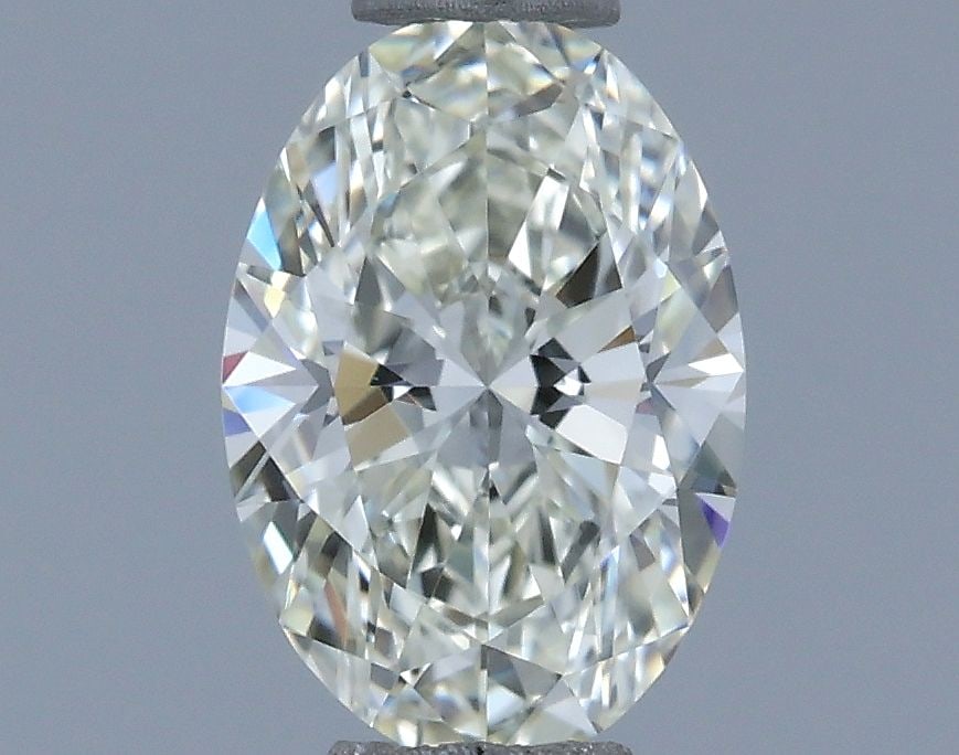 IGI Oval 0.54ct J VVS1 - Loose Natural Diamond: IGI Oval 0.54ct J VVS1 - Loose Natural Diamond 0.54ct IGI Oval J VVS1 Diamond - Natural Beauty Shines Through. This exquisite oval-cut diamond boasts a vibrant J color, exceptional clarity as VVS1, an