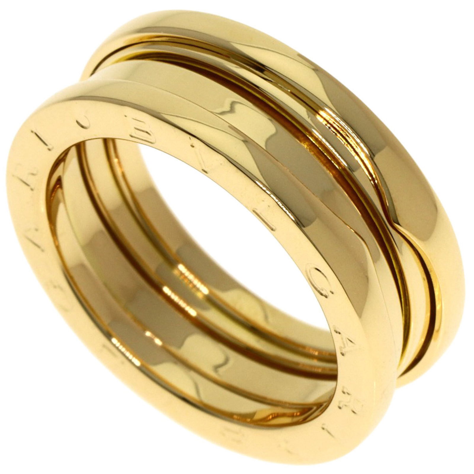 Bvlgari Band Ring Yellow Gold (18K): Bvlgari Band Ring Yellow Gold (18K) Yellow gold (18K) band ring from Bvlgari, featuring the iconic brand's signature style. This women's ring boasts a classic design with a sleek yellow gold finish an
