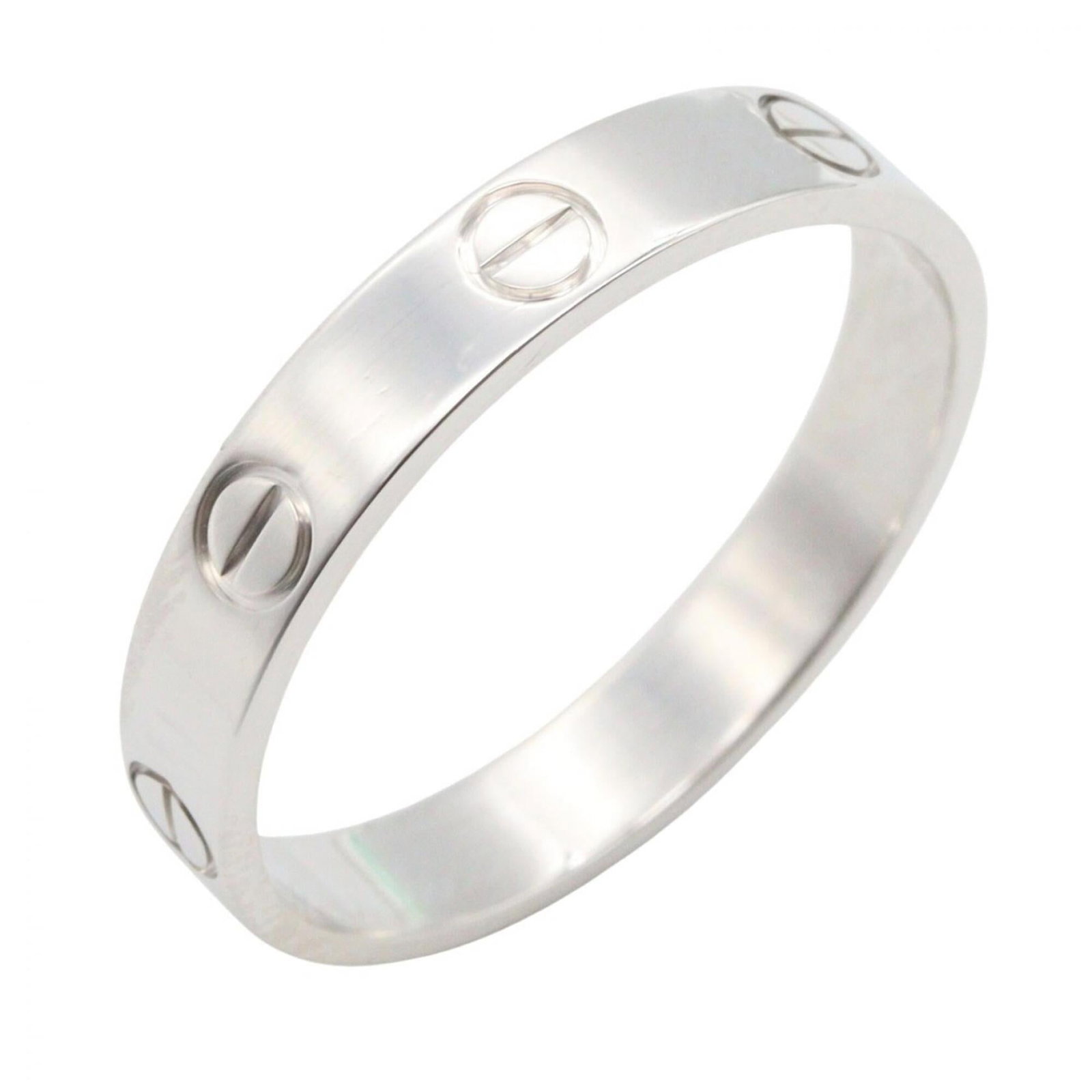 White Gold Band Ring by Cartier 18K: White Gold Band Ring by Cartier 18K White Gold Band Ring by Cartier 18K features a classic design with a sleek, modern aesthetic. Made from high-quality white gold (18K), this band ring boasts a timel