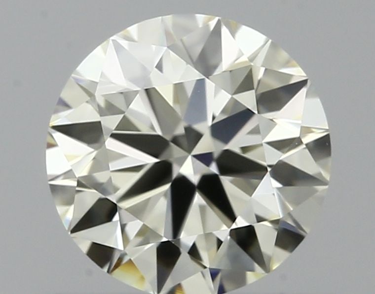 IGI Round 0.54ct K VVS1 - Loose Natural Diamond: IGI Round 0.54ct K VVS1 - Loose Natural Diamond 0.54ct IGI Round K VVS1 Diamond - A Natural BeautyThis loose, round diamond boasts exceptional clarity and color, with a VVS1 grade indicating minimal i