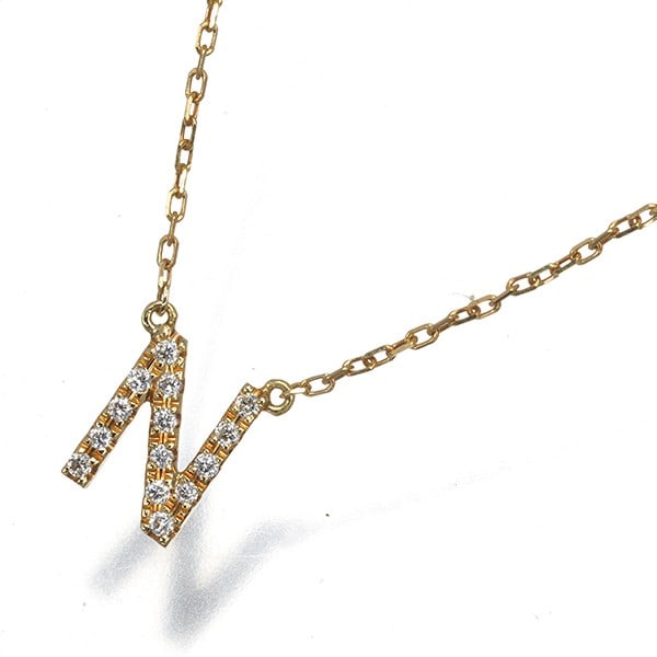 Ahkah Necklace Diamond Initial N 18K 750 Yellow Gold: Ahkah Necklace Diamond Initial N 18K 750 Yellow Gold 18k yellow gold necklace featuring a natural diamond pendant, weighing 1.4g and measuring 38/39cm in length, with the diamond itself being 0.05ct t