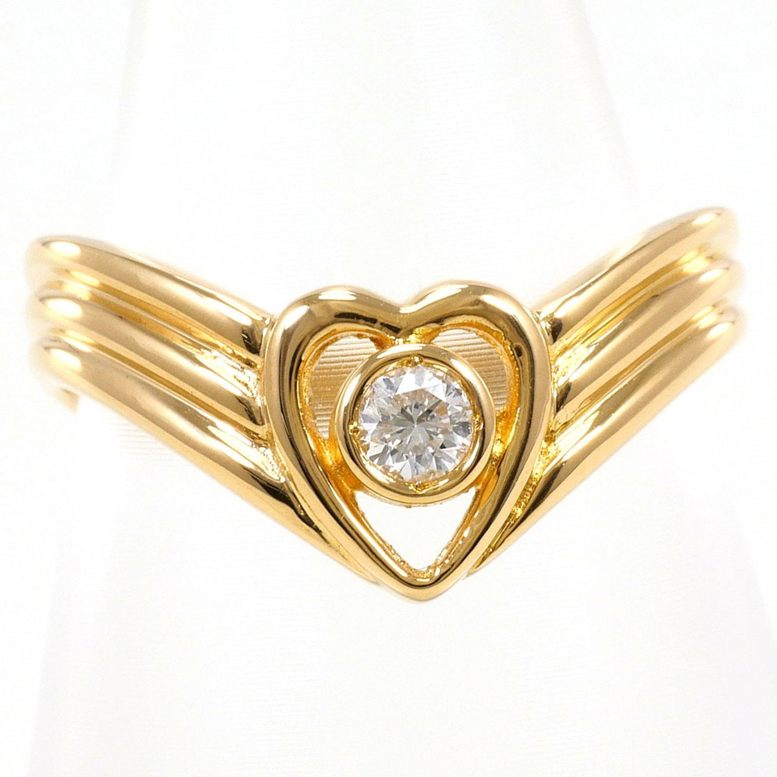 Yellow gold band ring unbranded: Yellow gold band ring unbranded Yellow gold band ring with a diamond weighing 0.10 carats, set in an 18K yellow gold band with a US size 6 fit and a width of 8mm. This unbranded piece features a class