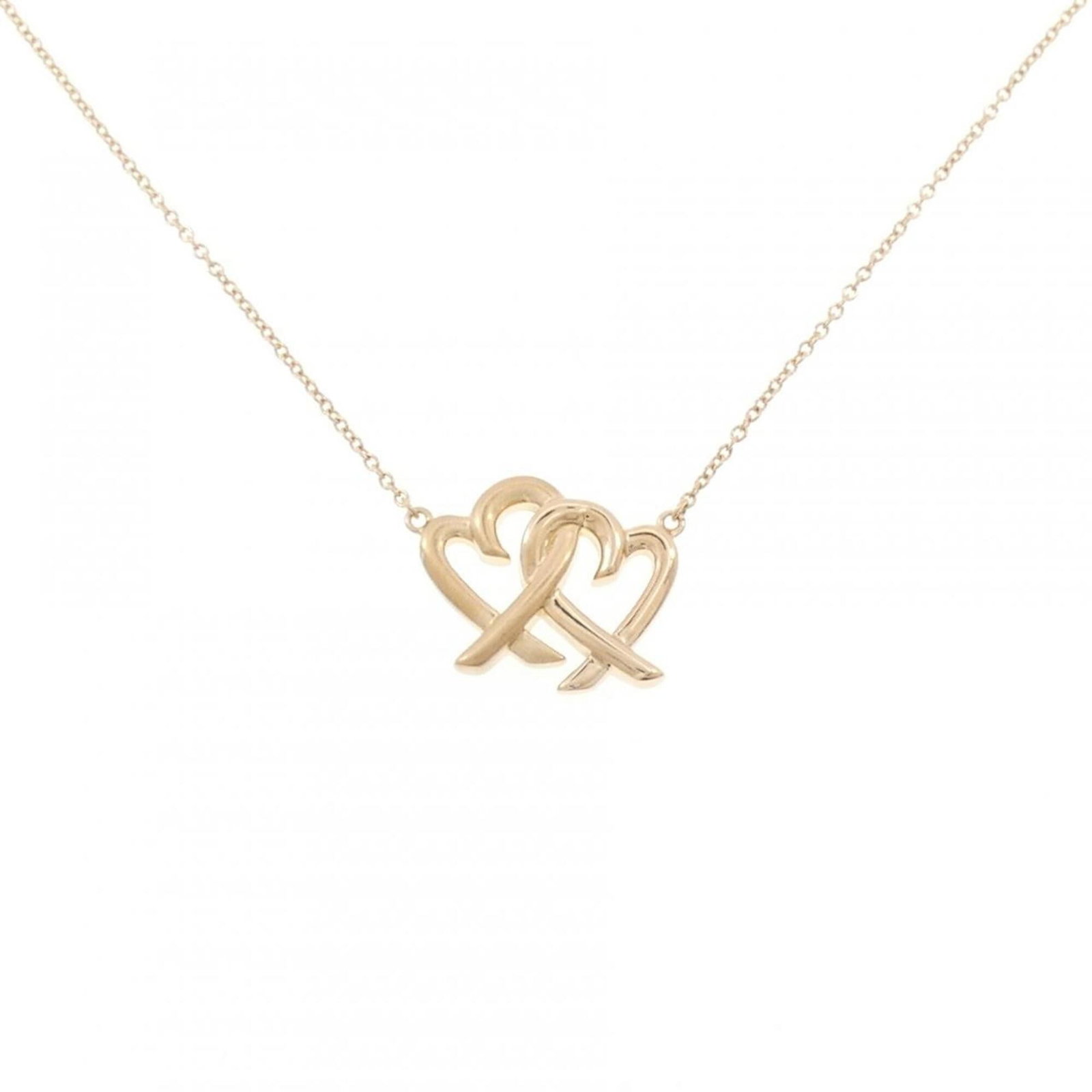 Heart Interlocking Necklace by Tiffany: Heart Interlocking Necklace by Tiffany Pink gold (18K) pendant necklace with an interlocking heart design, measuring 14mm x 17mm. The necklace features a 46 cm / 18.11'' circumference and is made from