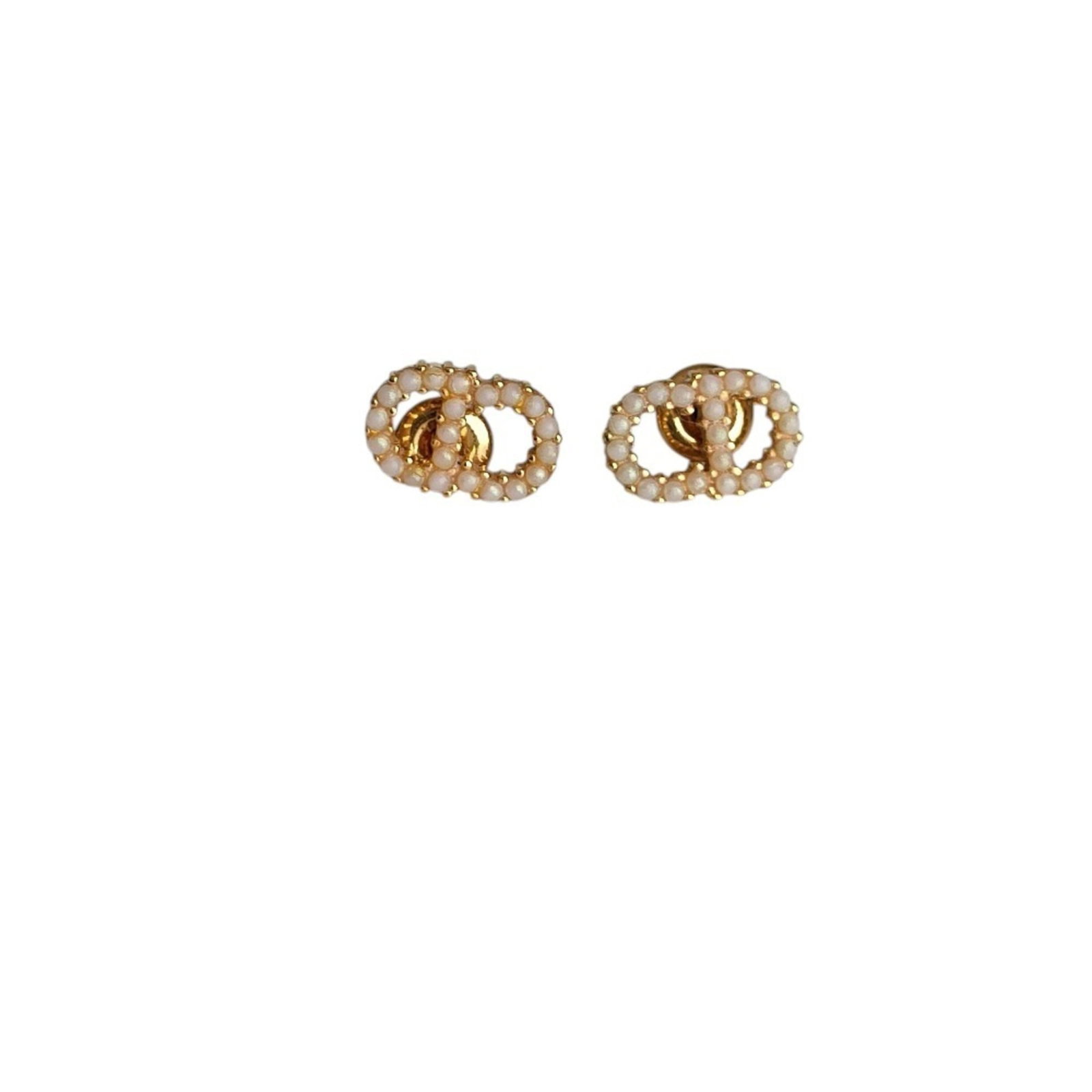 Stud earrings by Christian Dior: Stud earrings by Christian Dior Gold stud earrings by Christian Dior, measuring 6.00mm x 9.00mm in size. These elegant earrings feature a classic design that adds sophistication to any outfit. With th