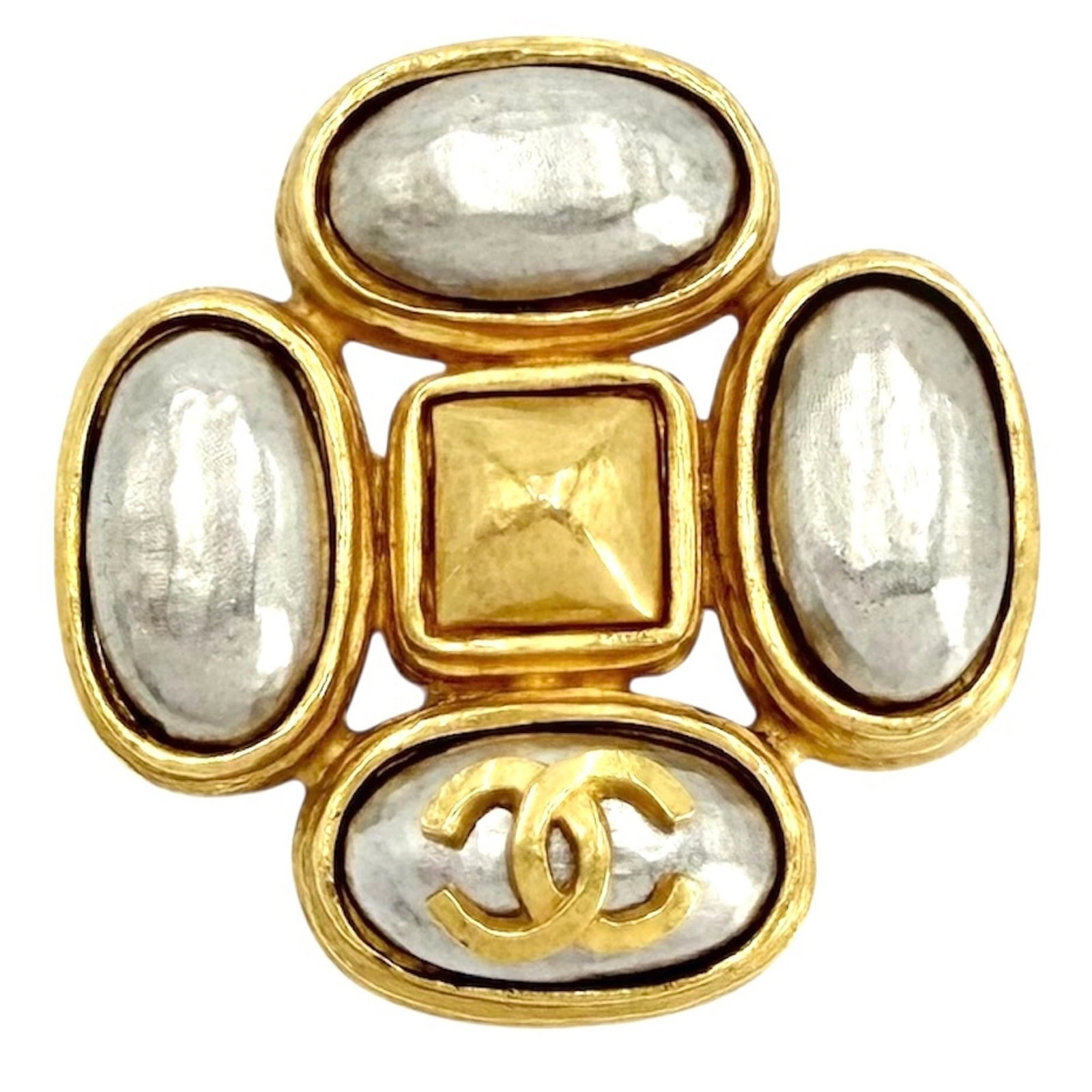 Chanel Brooch: Chanel Brooch Gold plated Chanel brooch with a sleek, minimalist design. Measuring 4cm x 4cm x 6mm, it showcases the iconic brand's signature style in a compact yet elegant form. Made from gold plated