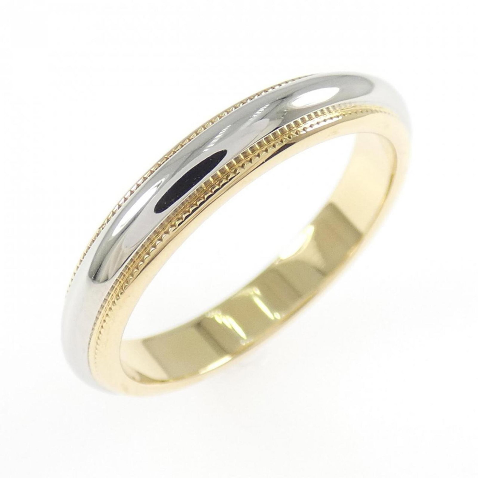Tiffany & Co. Milgrain Ring: Tiffany & Co. Milgrain Ring Yellow gold (18K) Tiffany & Co. Milgrain Ring, available in US size 7, showcases intricate milgrain details that add a touch of vintage elegance to its classic design. This