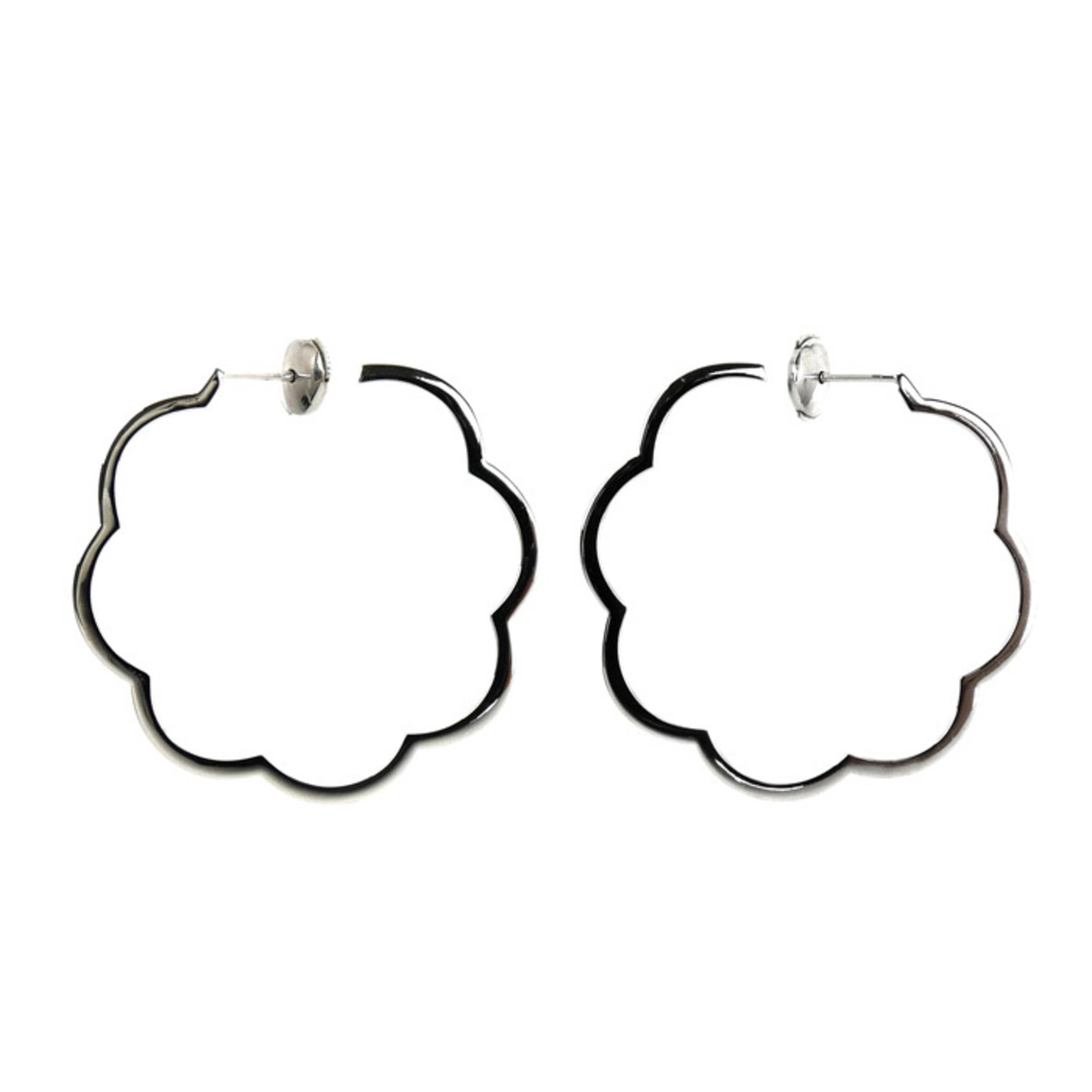Chanel Stud Earrings White Gold (18K): Chanel Stud Earrings White Gold (18K) Chanel's iconic stud earrings are crafted from 18K white gold, showcasing the luxury brand's signature style. The sleek design and premium material make these ear