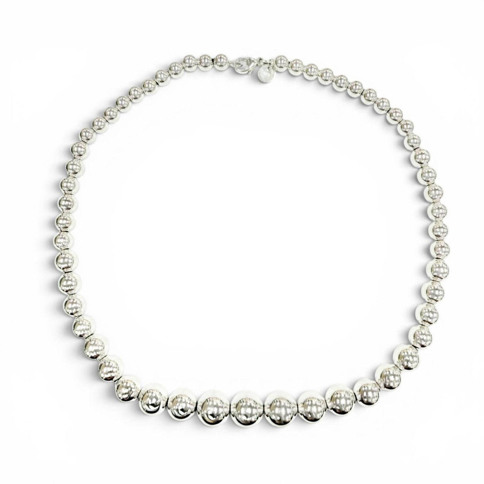 Tiffany Co Women's Graduated Ball Necklace 925 Sterling Silver 27.9G: Tiffany Co Women's Graduated Ball Necklace 925 Sterling Silver 27.9G Tiffany Co's Women's Graduated Ball Necklace is crafted from 925 Sterling Silver, creating a timeless and elegant piece. The neckla