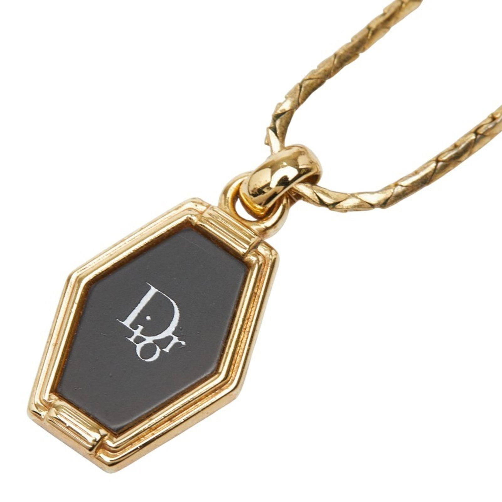 Women's honeycomb motif necklace in metal from Christian Dior: Women's honeycomb motif necklace in metal from Christian Dior Christian Dior's honeycomb motif necklace is a striking piece featuring metal craftsmanship. The intricate design, characteristic of the b