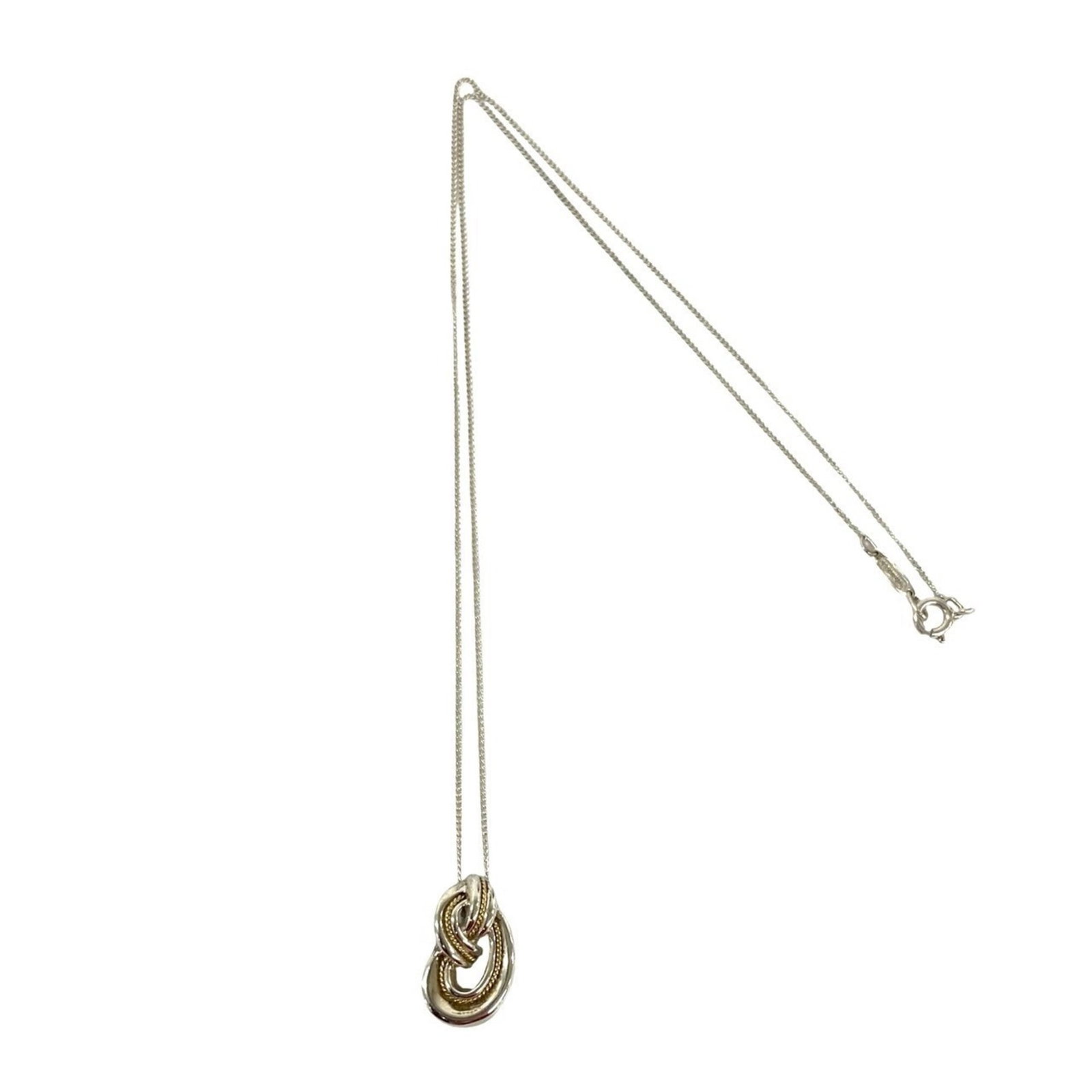 Twist Knot Rope Necklace Sterling Silver 925 18K Yellow Gold Tiffany & Co Accessory: Twist Knot Rope Necklace Sterling Silver 925 18K Yellow Gold Tiffany & Co Accessory Twist Knot Rope Necklace in Sterling Silver and 18K Yellow Gold. This elegant necklace features a unique twist knot 