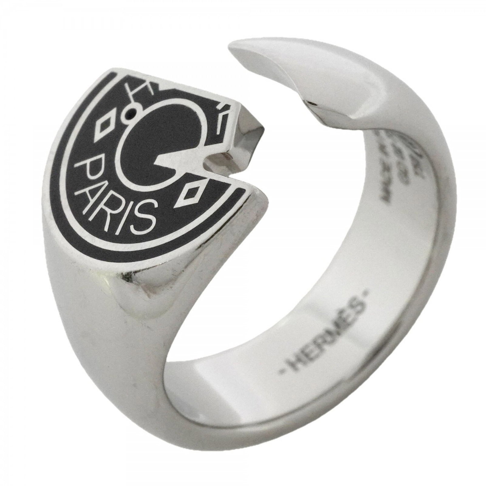 Metal ring band by Hermes: Metal ring band by Hermes Metal ring band by Hermes features a sleek black and silver metal design, crafted from high-quality metal. This men's band ring boasts a classic style with a US size 9 fit. M
