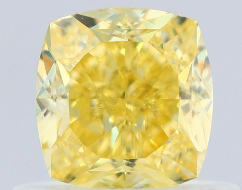 GIA Cushion Brilliant 0.68ct Fancy Intense Yellow FL - Loose Natural Diamond: GIA Cushion Brilliant 0.68ct Fancy Intense Yellow FL - Loose Natural Diamond GIA certified Fancy Intense Yellow diamond with exceptional clarity and polish, boasting vibrant color and precise cut. Thi