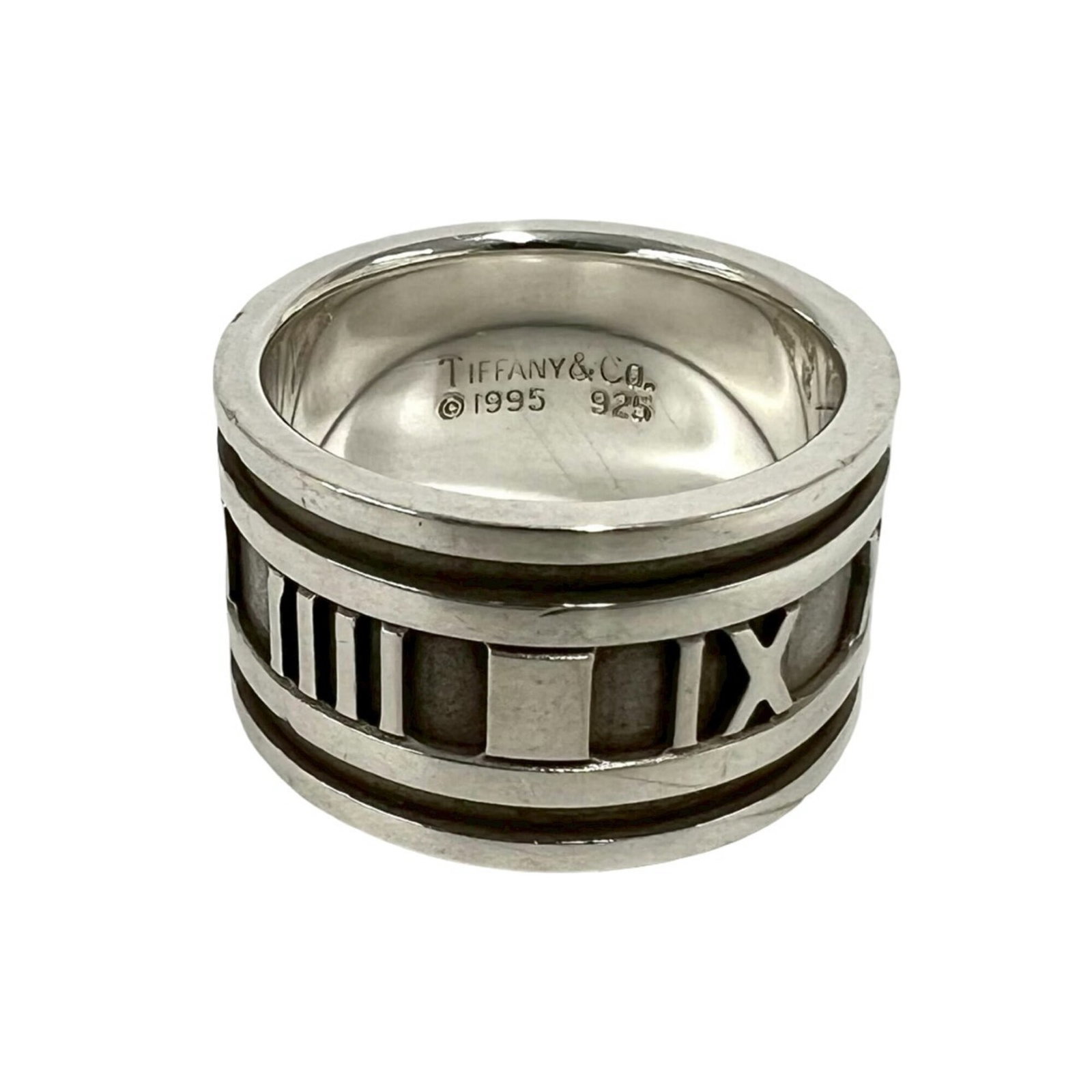 Silver Ring Band Tiffany: Silver Ring Band Tiffany Silver Ring Band Tiffany is made from high-quality silver, with a US size of 7. This band ring features a classic design that suits women's fashion. Made from 925 sterling sil