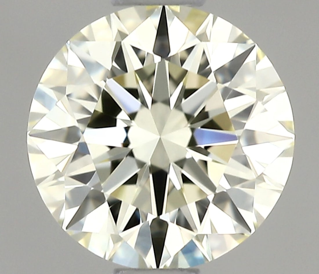 IGI Round 0.62ct M IF - Loose Natural Diamond: IGI Round 0.62ct M IF - Loose Natural Diamond 0.62ct M IF - Loose Natural Diamond, certified by the International Gemological Institute (IGI), boasts an EX cut and polish, with a clarity grade of IF a