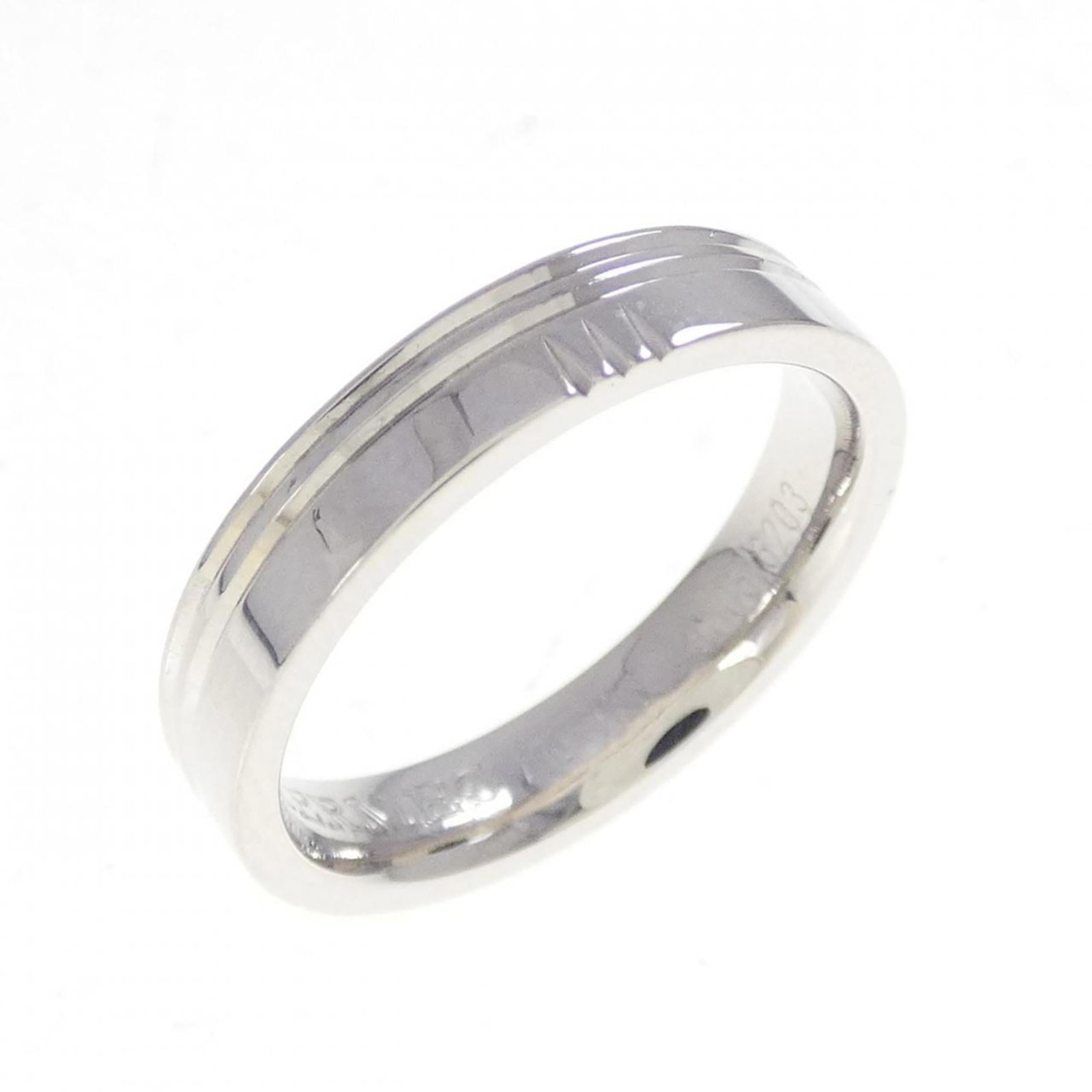 White Gold Hermes Ring Band: White Gold Hermes Ring Band White Gold Hermes Ring Band. This 18K white gold band features the iconic Hermes brand, adding an elegant touch to any outfit. With a US size 5 fit and 49mm length, it's