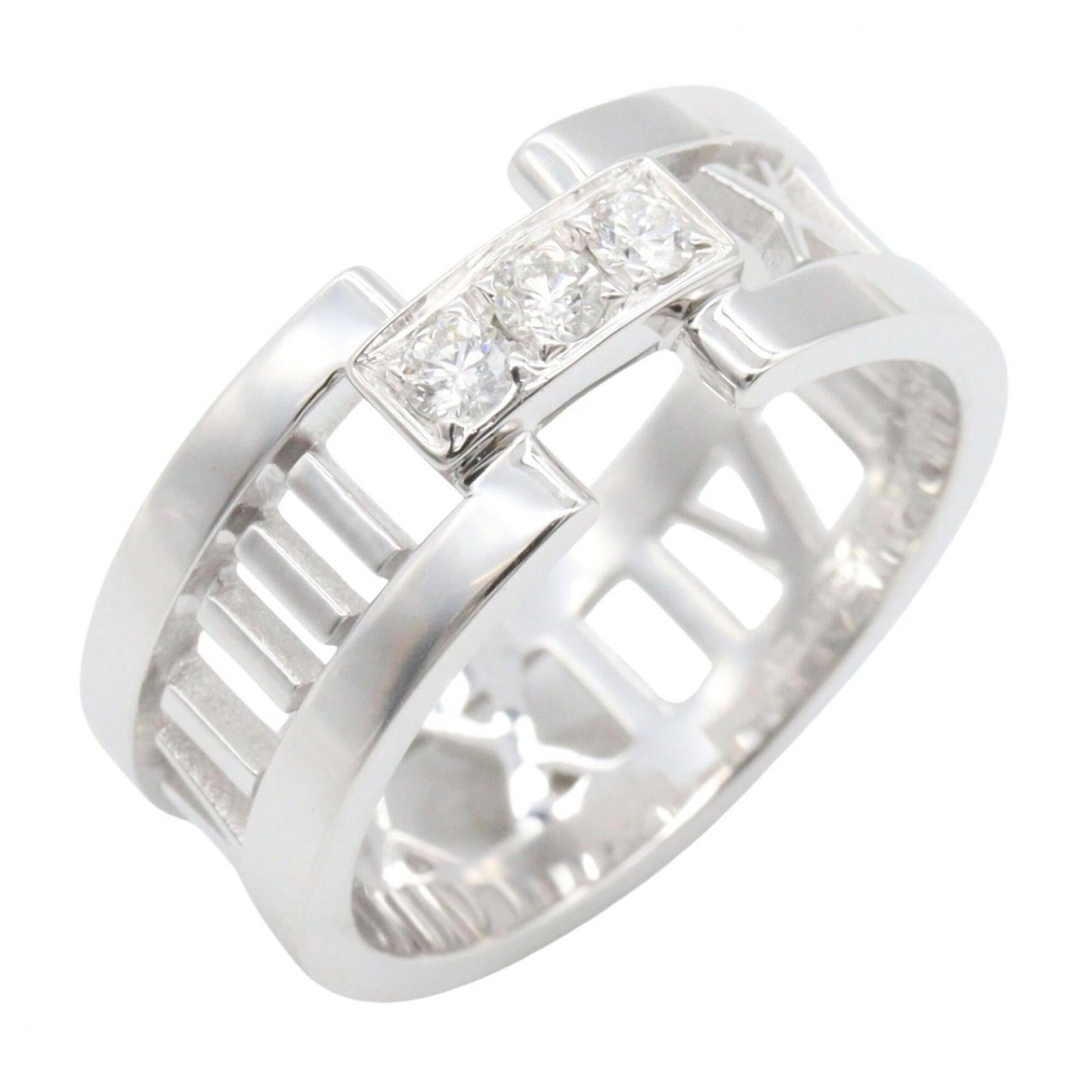 White Gold Tiffany Band Ring 18K: White Gold Tiffany Band Ring 18K White gold Tiffany band ring in 18K, available in US size 9. This clear and silver-toned piece showcases the classic design of Tiffany's iconic style. Made from high-q