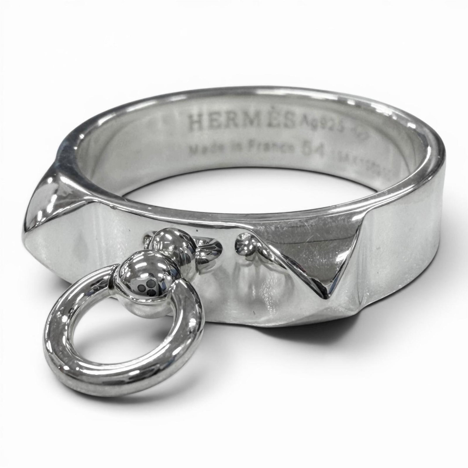 Ring silver band 925 by Hermes: Ring silver band 925 by Hermes Silver band ring by Hermes, crafted from high-quality 925 silver. This elegant piece boasts a sleek design, perfect for adding a touch of sophistication to any outfit. W